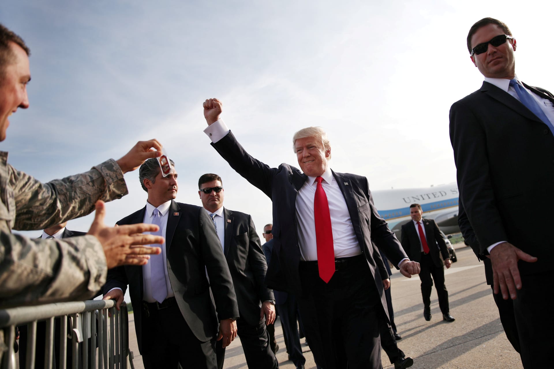 <p>U.S. President Donald Trump reacts as he arrives at Harrisburg international airport.</p>
