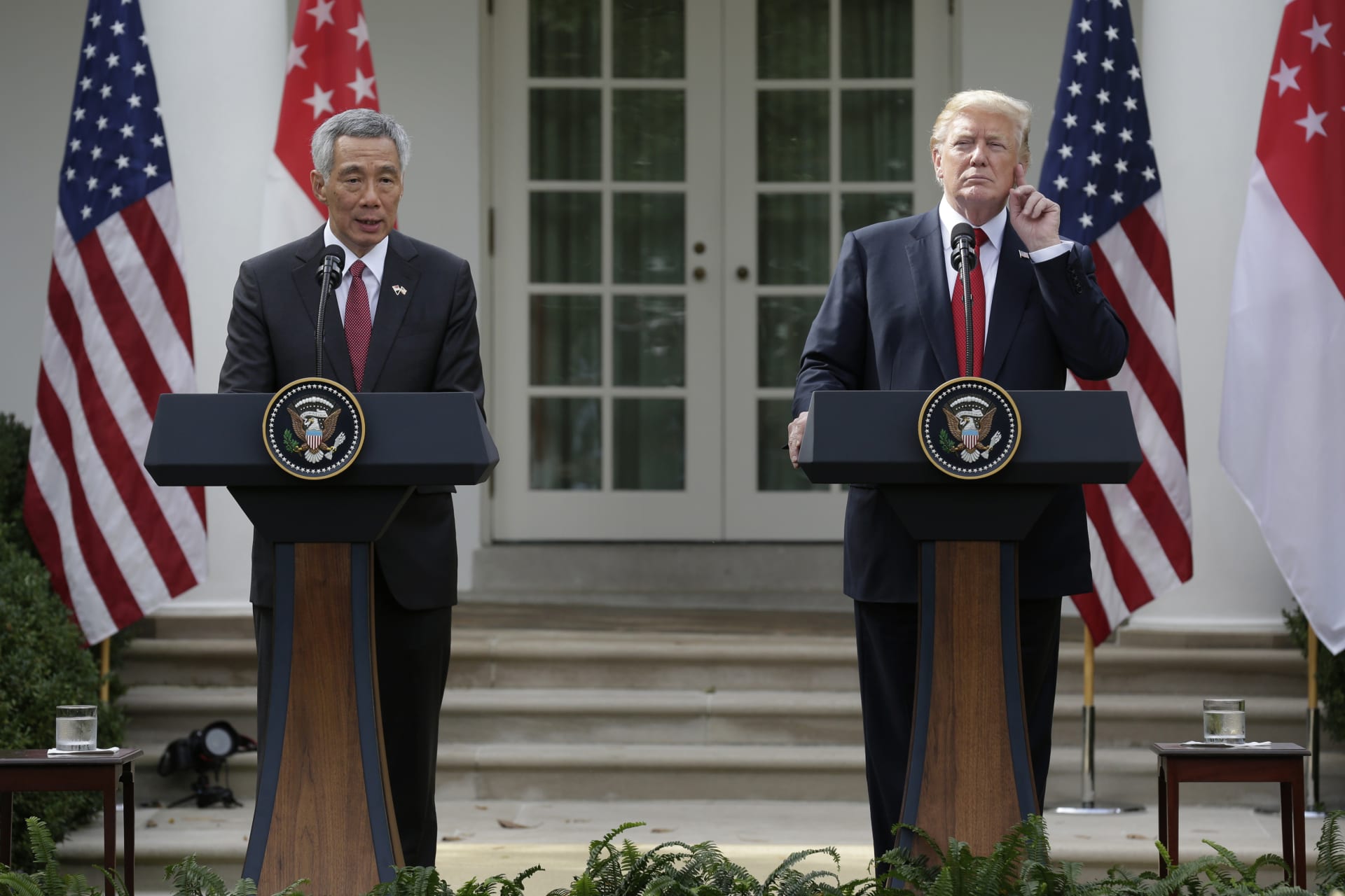 <p>Singapore’s Prime Minister Lee Hsien Loong and U.S. President Donald J. Trump give joint statements in the Rose Garden of the White House in Washington, DC on October 23, 2017.</p>
