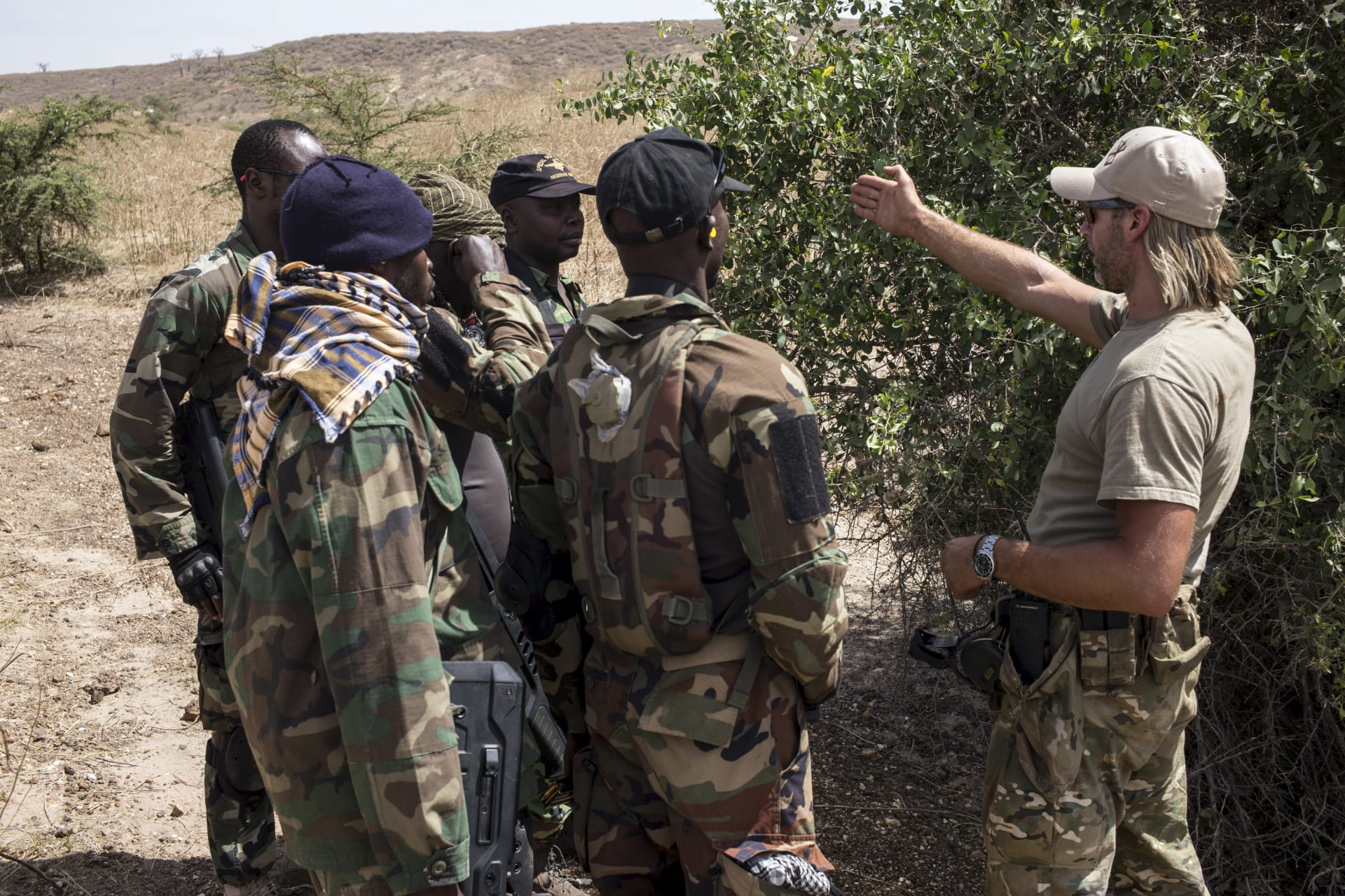 <p>A U.S. special forces soldier trains Nigerian soldiers during Flintlock 2016, a U.S.-led international training exercise with African militaries in Thies, Senegal, February 11, 2016.</p>
