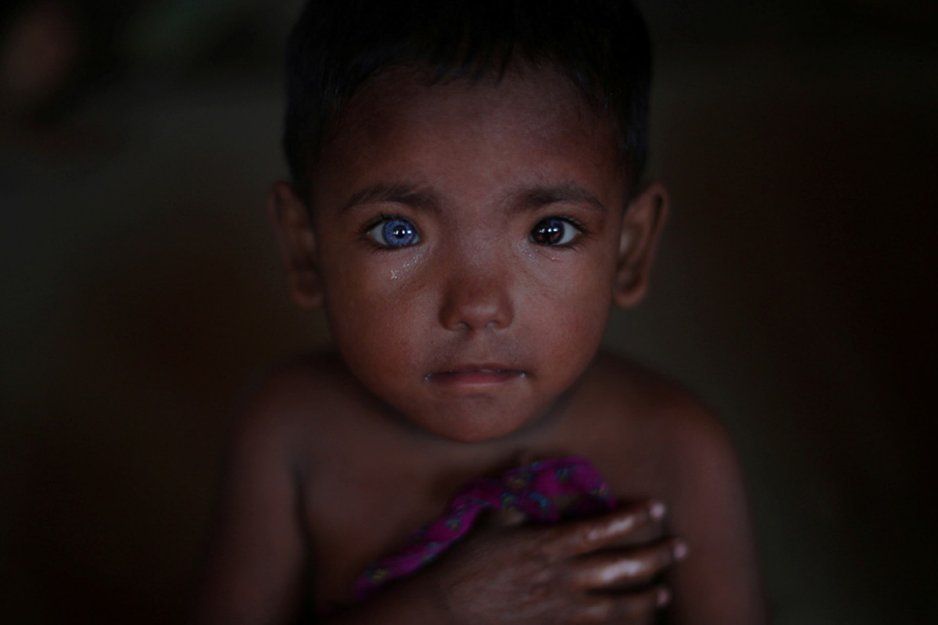 <p>A Rohingya child is seen in a refugee encampment in Bangladesh.</p>
