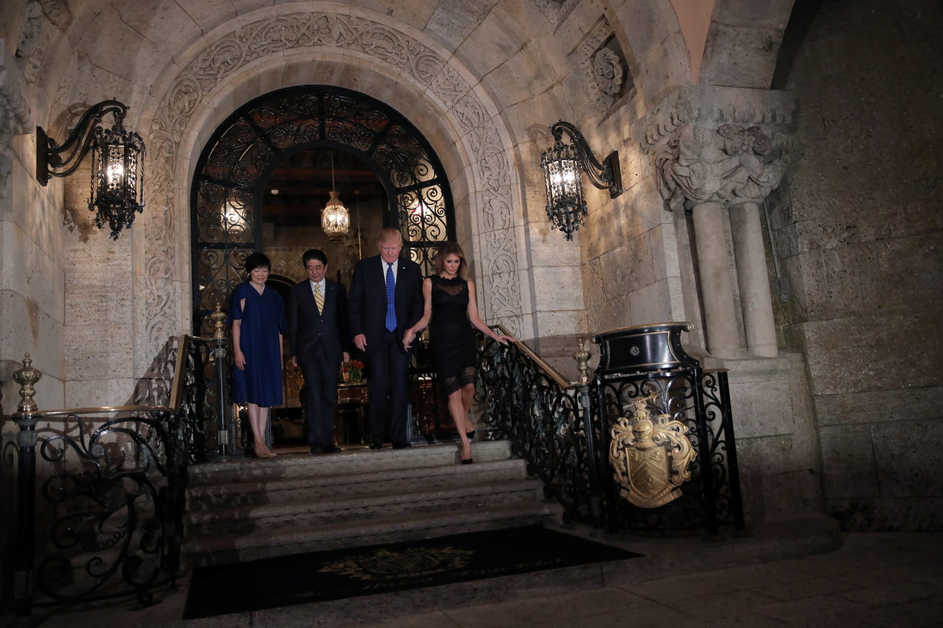 <p>U.S. President Donald Trump, First Lady Melania Trump, Japanese Prime Minister Shinzo Abe, and his wife Akie Abe pose for a photograph before attending dinner at Mar-a-Lago Club in Palm Beach, Florida, on February 11, 2017.</p>
