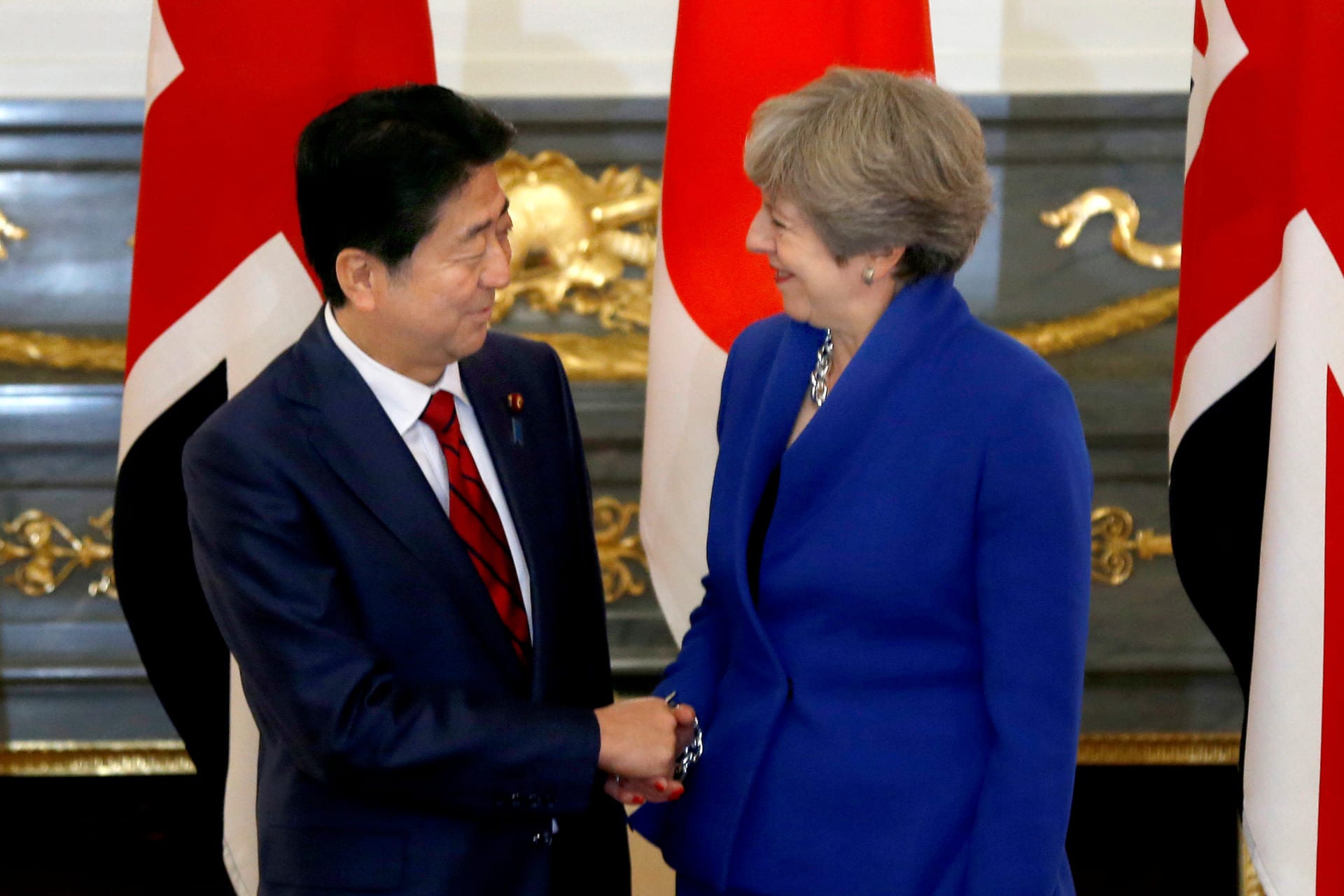 <p>British Prime Minister Theresa May is greeted by her Japanese counterpart Shinzo Abe prior to a meeting at Akasaka Palace state guest house in Tokyo, Japan on August 31, 2017. </p>