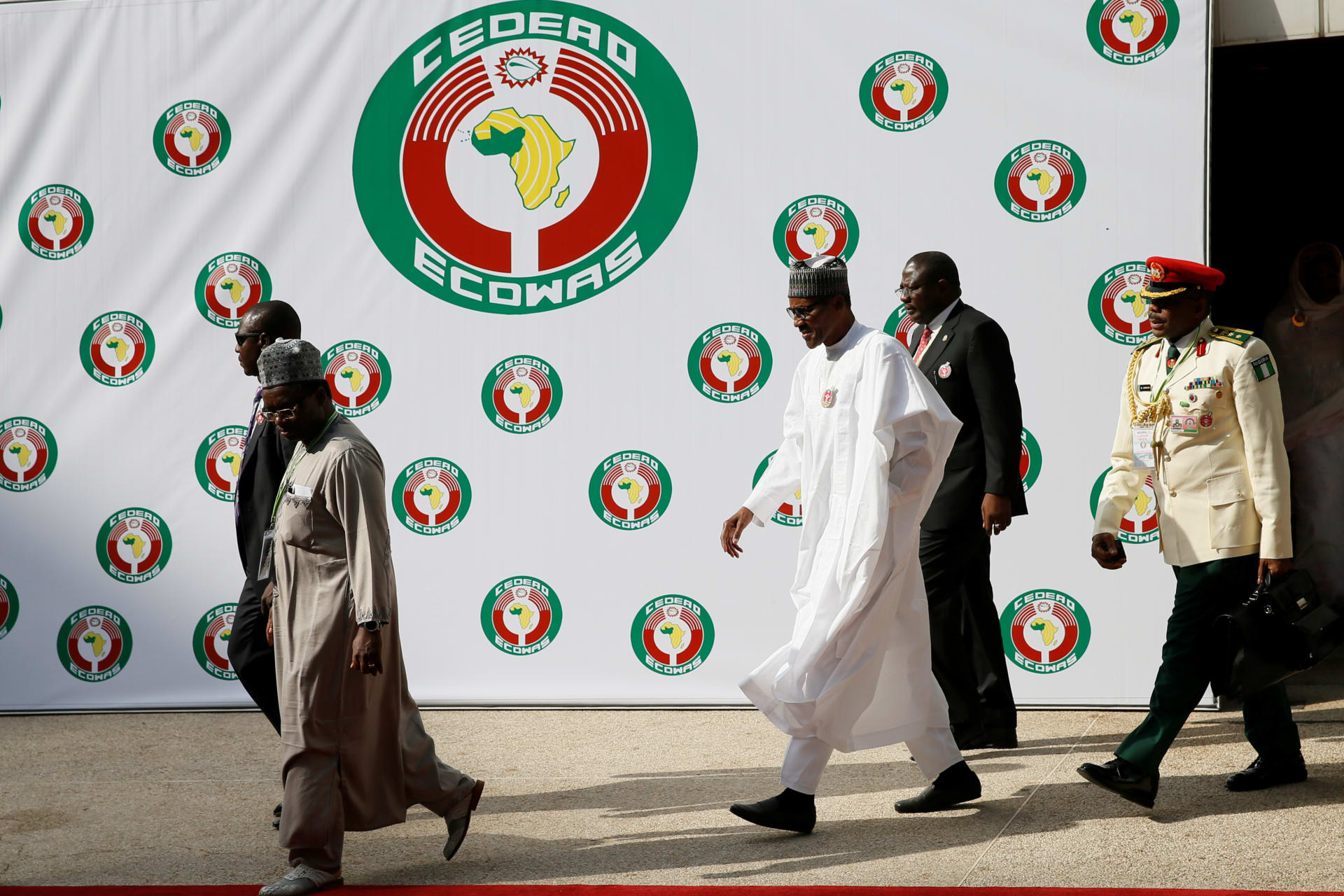 <p>Nigeria’s President Muhammadu Buhari leaves the 52nd ECOWAS Summit in Abuja, Nigeria December 16, 2017.</p>