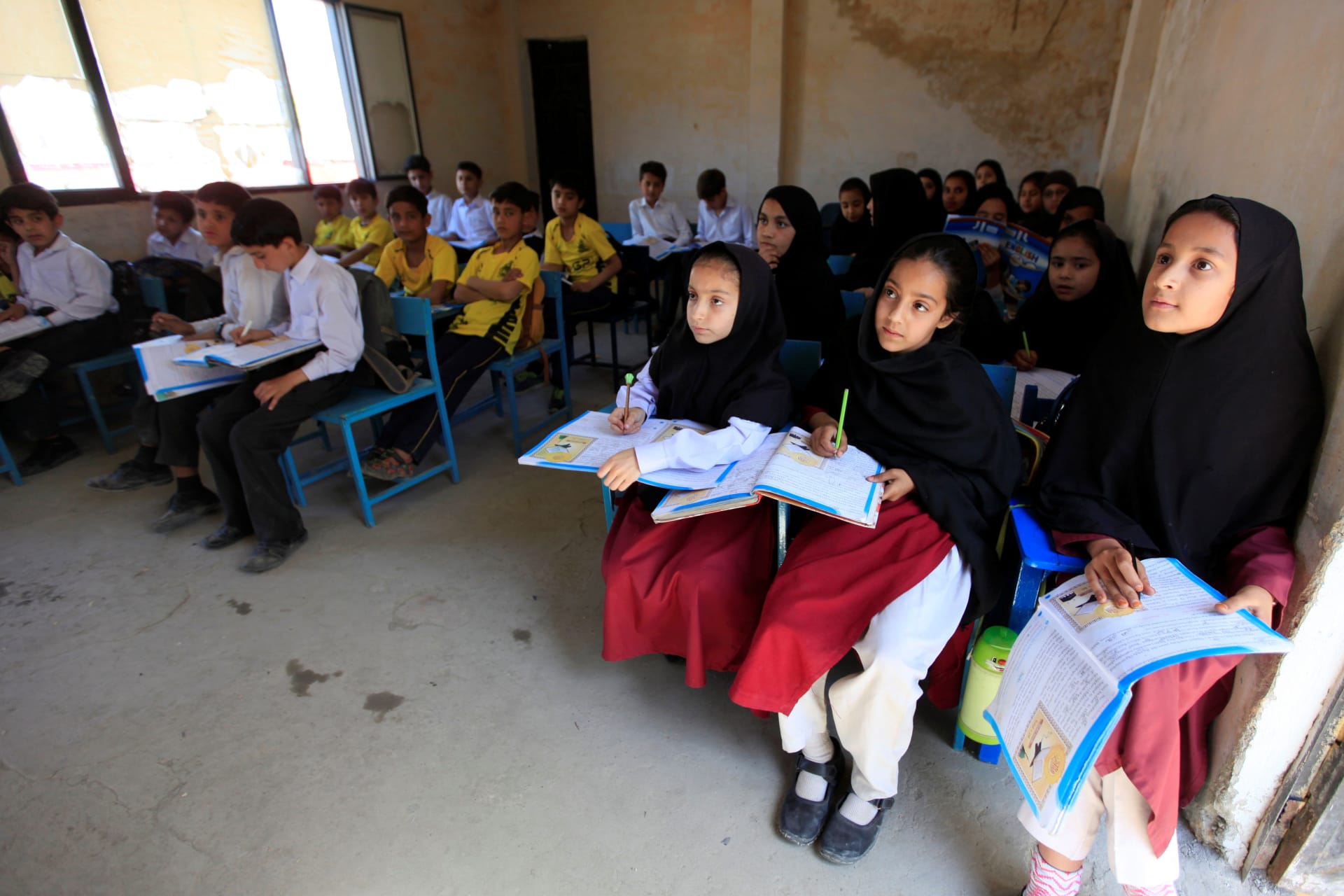 <p>Children attending class at Khushal school that Nobel Peace Prize laureate Malala Yousafzai used to attend, founded by her father Ziauddin, in her hometown of Mingora in Swat Valley, Pakistan March 30, 2018</p>
