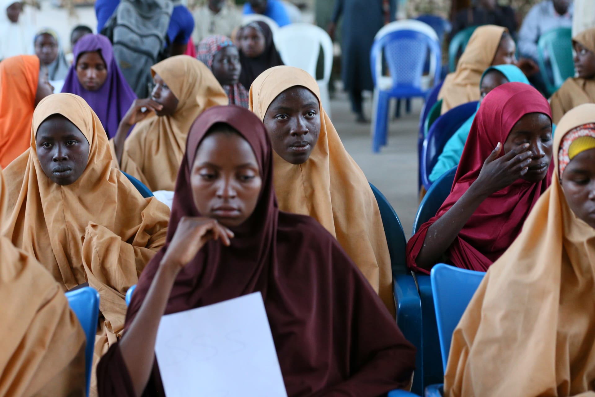 <p>A group of newly-released Dapchi school girls at the air force base in Maiduguri, Nigeria, waiting to board a plane, March 21, 2018</p>
