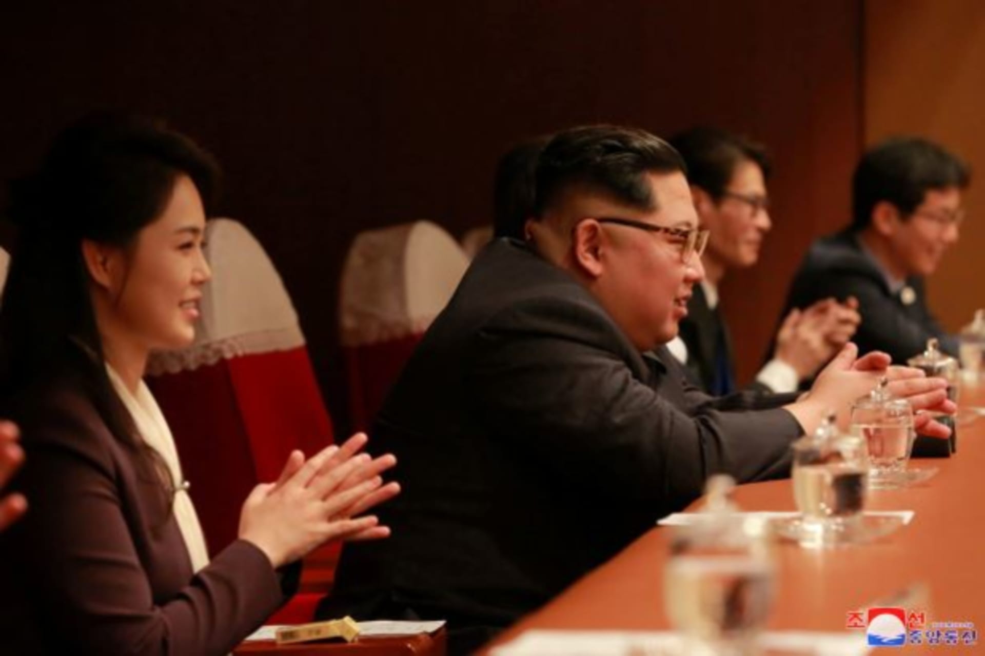 <p>North Korean leader Kim Jong Un and his wife Ri Sol Ju watch South Korean K-pop singers perform in a concert.</p>
