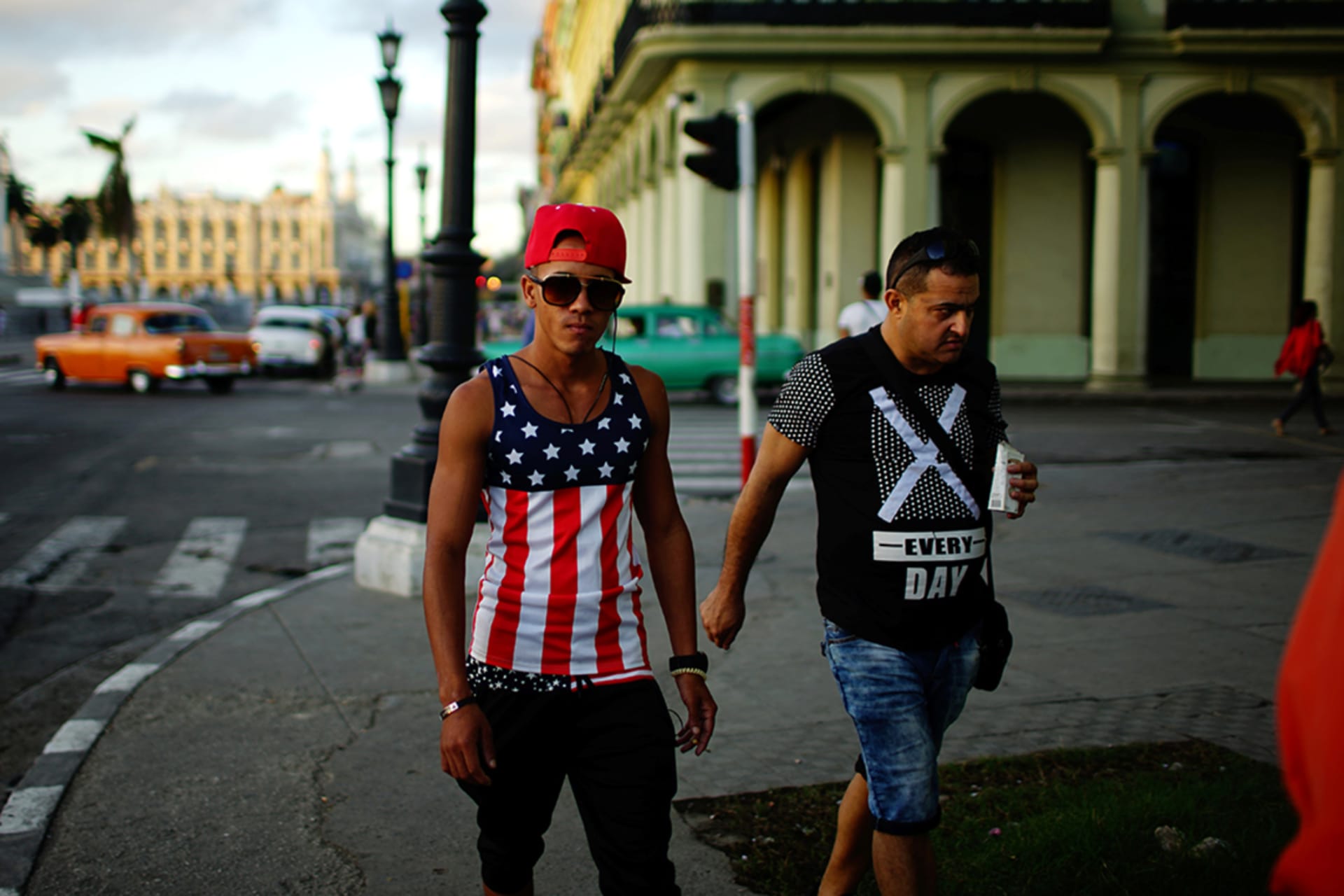 <p>A man wearing the U.S. colors walks in Havana. </p>
