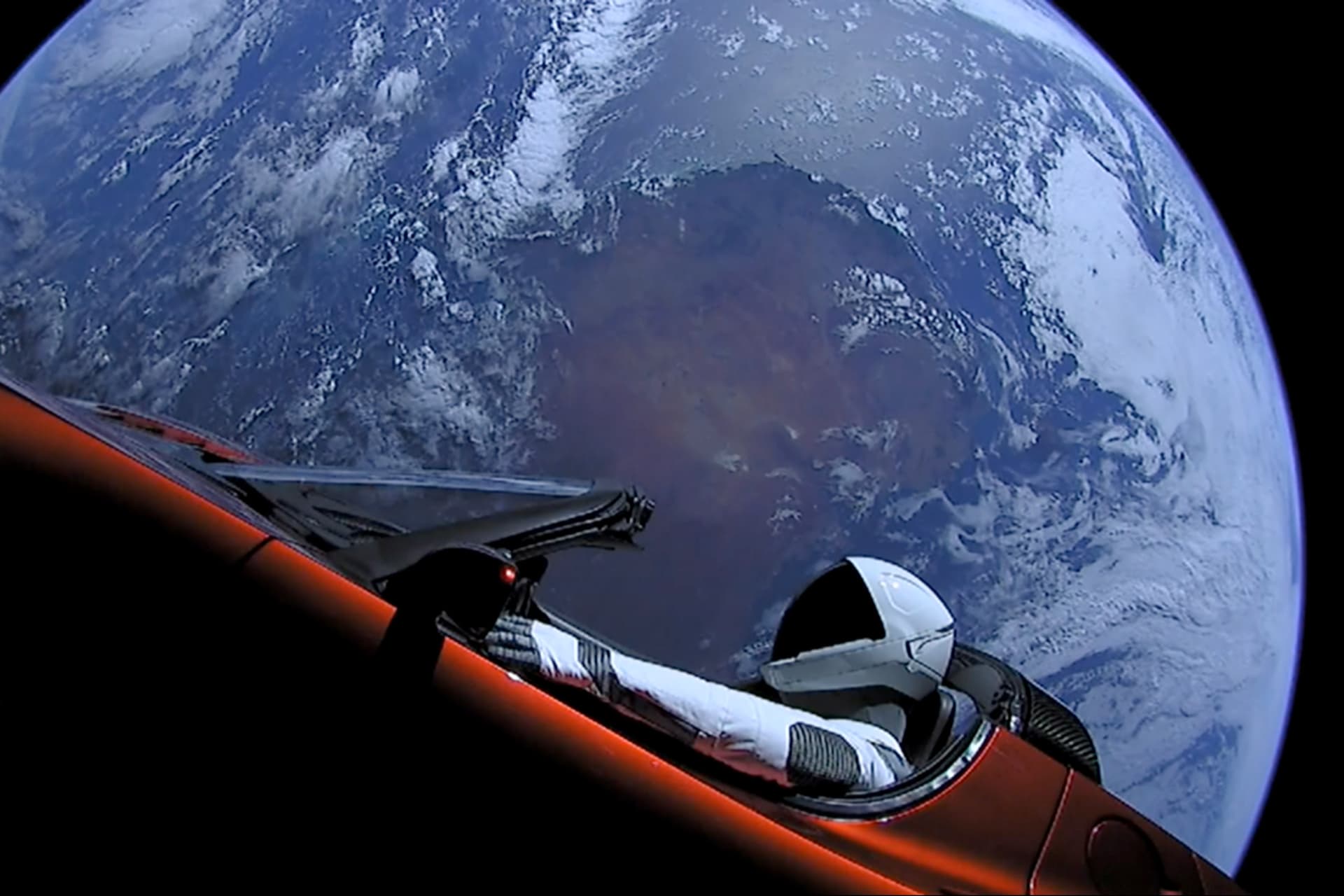 <p>A Tesla Roadster automobile floats through space after it was carried there by SpaceX’s Falcon Heavy. </p>
