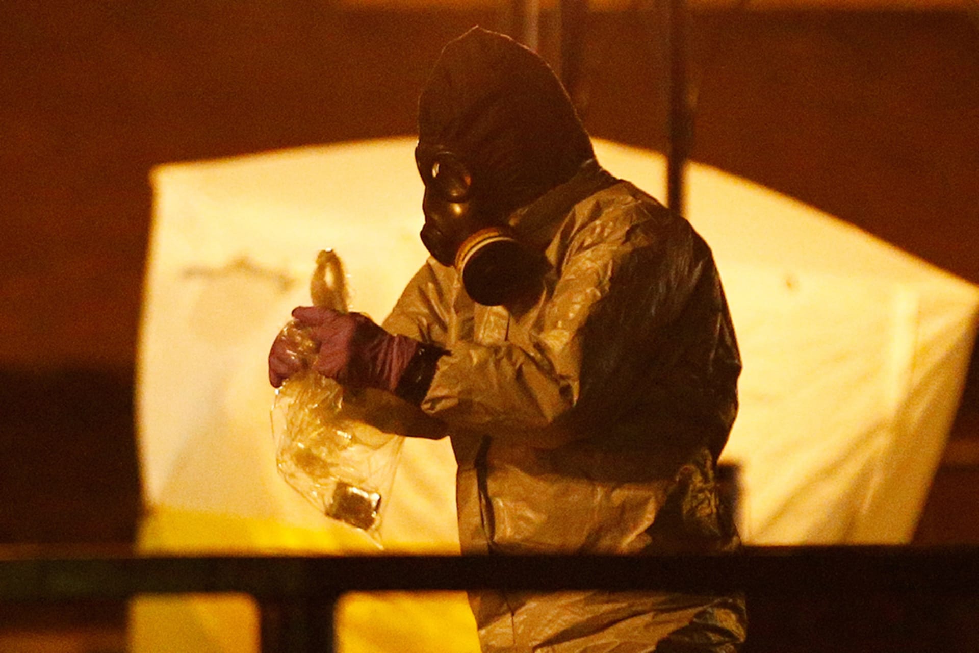<p>Members of UK emergency services work near the bench where former Russian intelligence officer Sergei Skripal and his daughter Yulia were found poisoned.</p>
