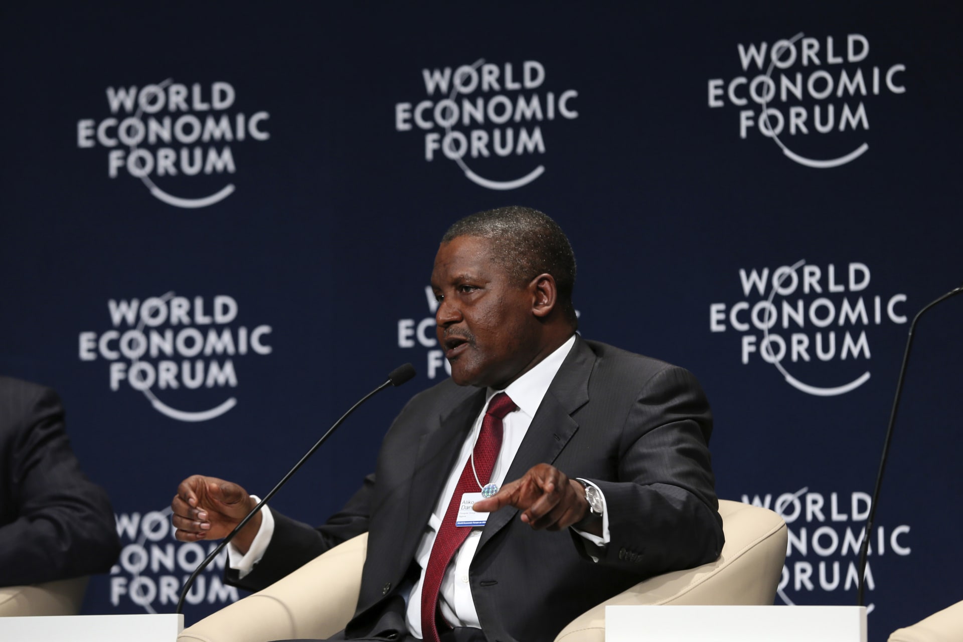 <p>Nigerian billionaire Aliko Dangote speaks during the first plenary session of the World Economic Forum (WEF) in Abuja May 8, 2014. Dangote tops the list of African billionaires in Forbes Africa.</p>
