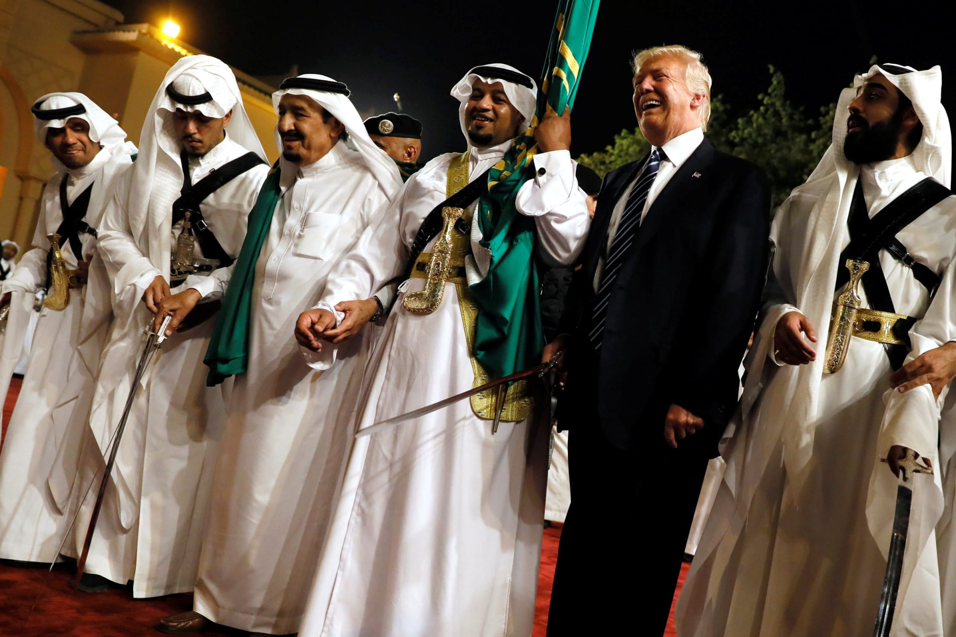 <p>U.S. President Donald Trump dances with a sword as he arrives to a welcome ceremony by Saudi Arabia’s King Salman bin Abdulaziz Al Saud at Al Murabba Palace in Riyadh</p>
