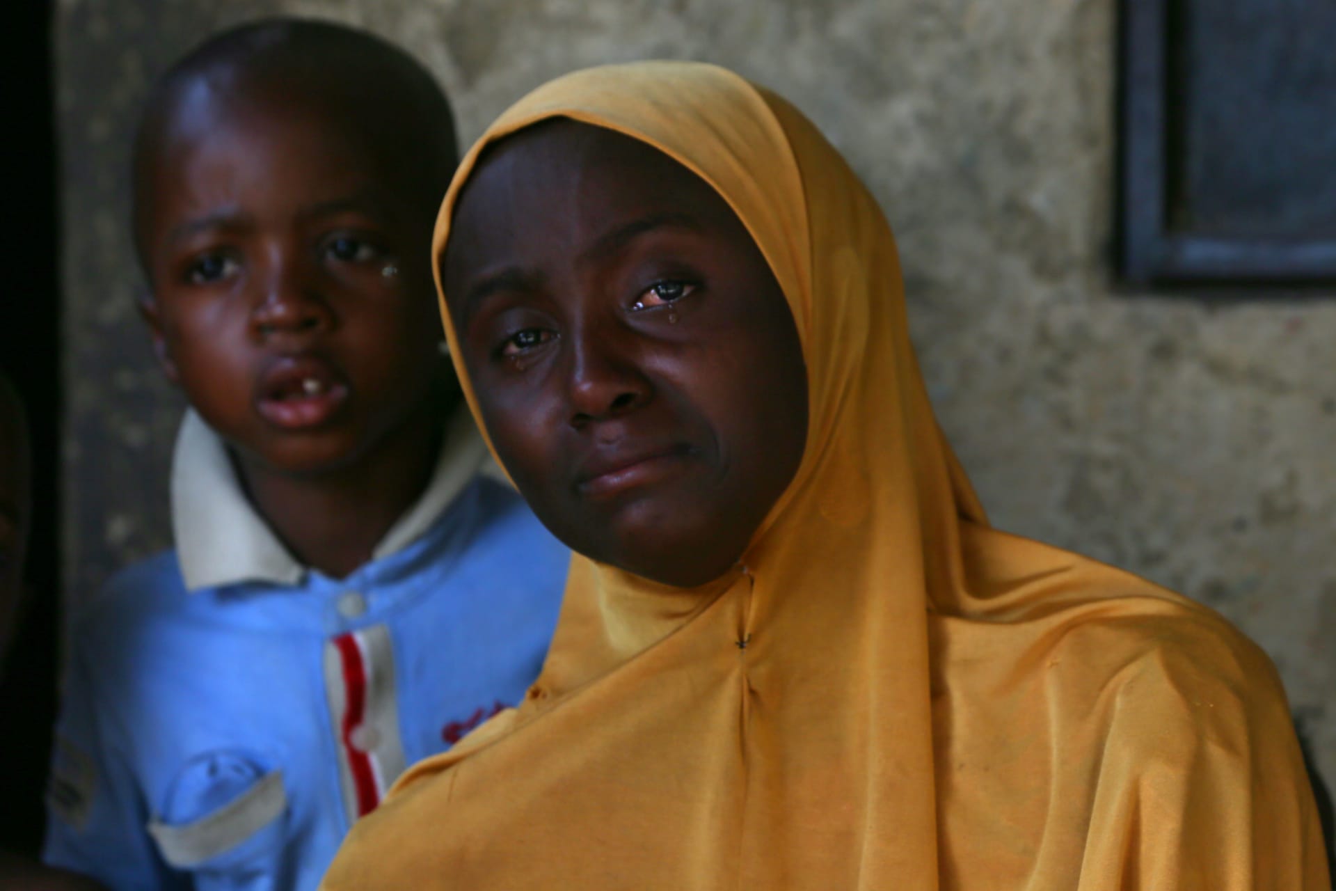 <p>A relative of one of the missing school girls reacts in Dapchi in the northeastern state of Yobe, after an attack on the village by Boko Haram, Nigeria February 23, 2018.</p>
