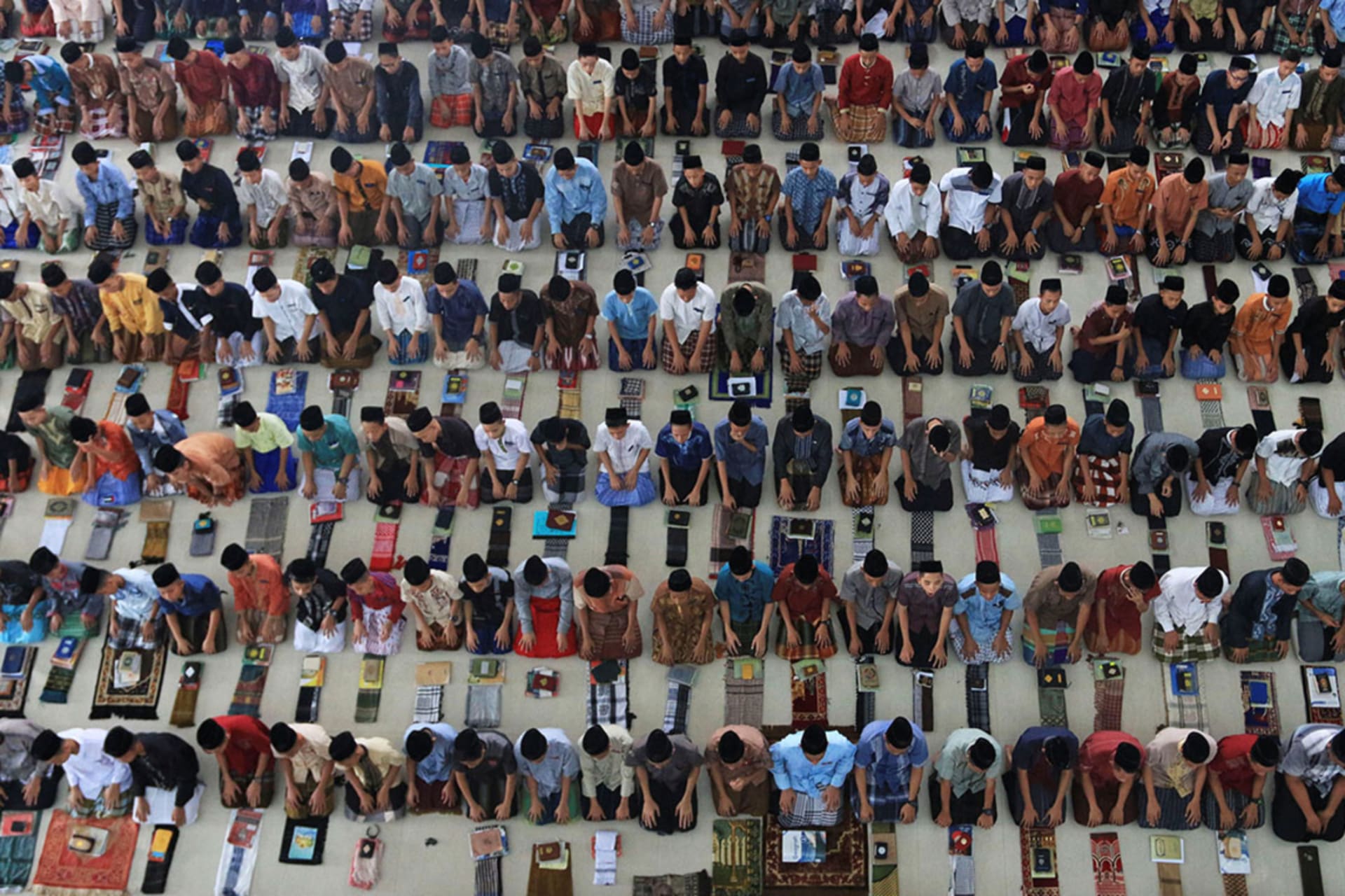 <p>Students pray at an Islamic boarding school in Indonesia.</p>
