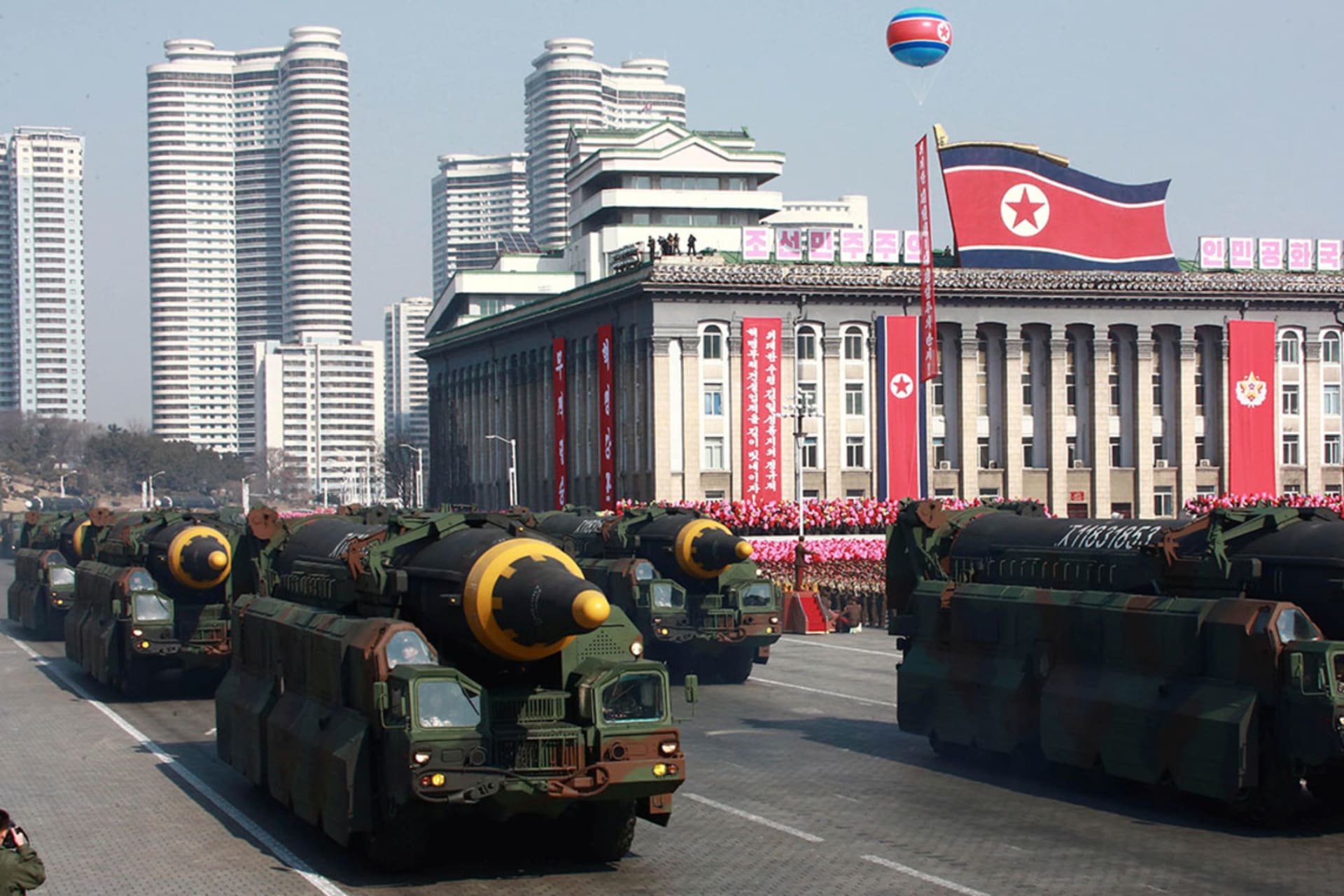 <p>North Korea parades Hwasong-12 intermediate-range ballistic missiles during a 2018 military parade.</p>

