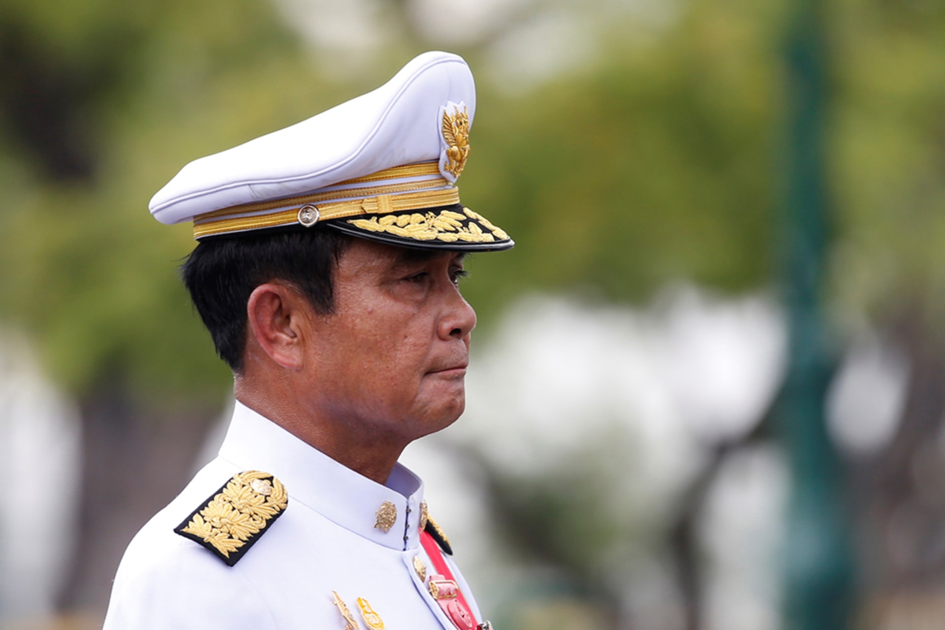 <p>Thailand’s Prime Minister Prayuth Chan-ocha marches in the royal cremation procession of late King Bhumibol Adulyadej at the Grand Palace in Bangkok, Thailand, on October 26, 2017.</p>
