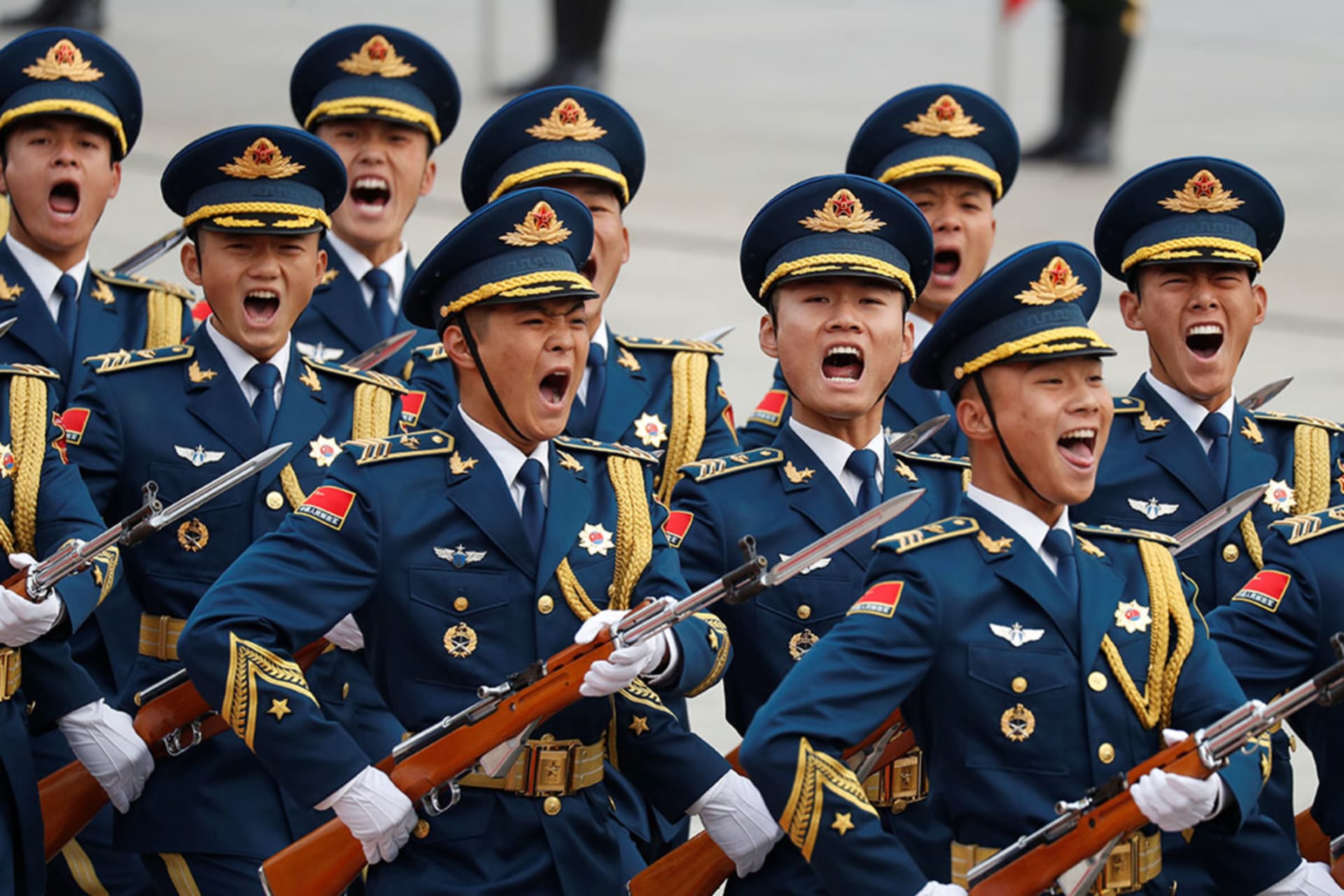 <p>Military troops march during a welcoming ceremony for U.S. President Donald Trump in Beijing, China. November 9, 2017.</p>
