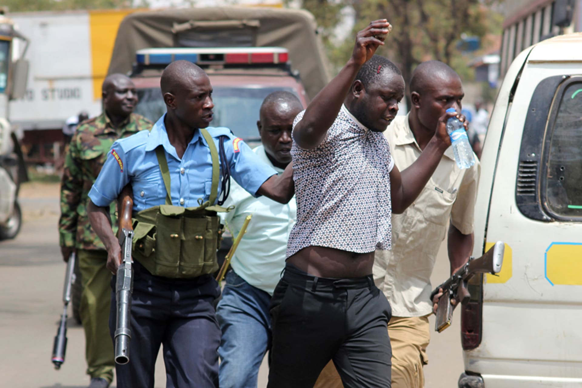 <p>Riot police detain a supporter of Kenyan opposition leader Raila Odinga of the National Super Alliance (NASA) coalition protesting against the treason charges on lawyer Miguna Miguna in the streets of Kisumu, Kenya February 6, 2018.</p>