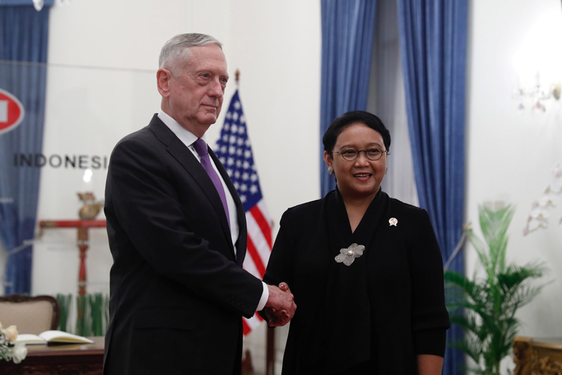 <p>Visiting U.S. Secretary of Defense Jim Mattis shakes hands with Indonesia’s Minister of Foreign Affairs Retno Marsudi at the Foreign Ministry in Jakarta, Indonesia on January 22, 2018.</p>
