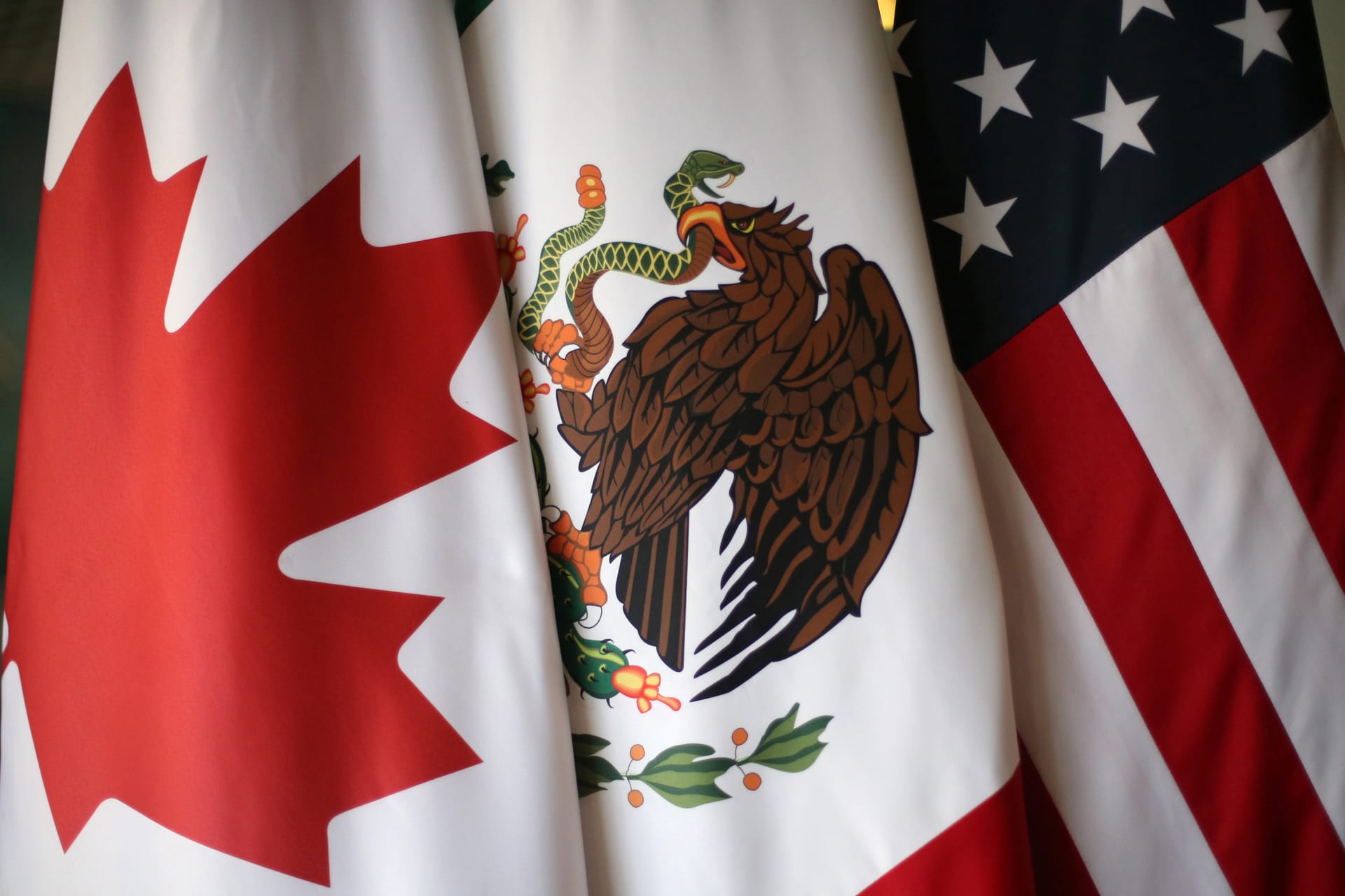 <p>Flags are pictured during the fifth round of NAFTA talks involving the United States, Mexico and Canada, in Mexico City, Mexico, November 19, 2017.</p>
