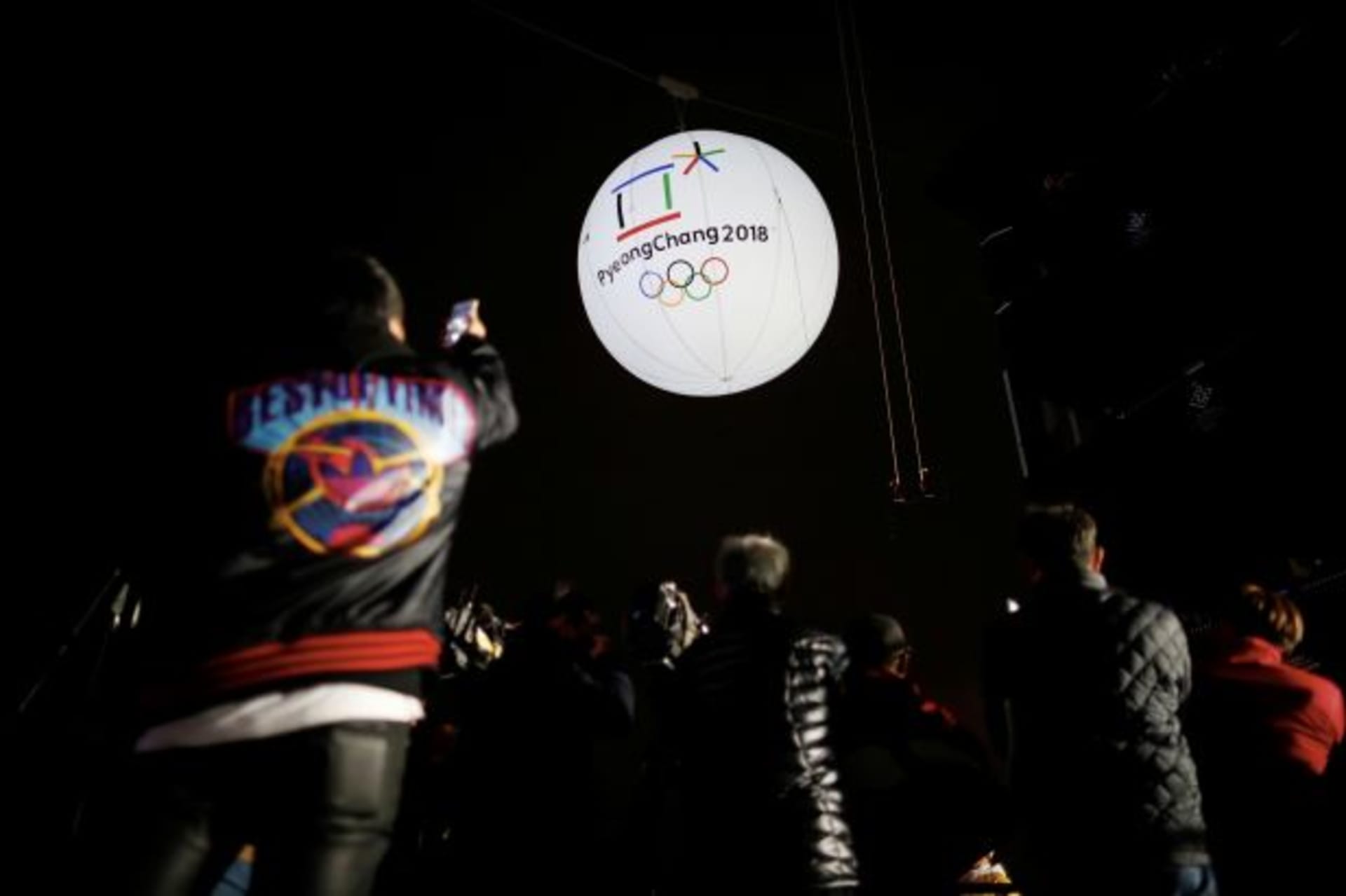 <p>Photographers take photographs of a giant inflatable ball bearing the logo of the 2018 Pyeongchang Winter Olympics in Incheon, South Korea, November 1, 2017.</p>