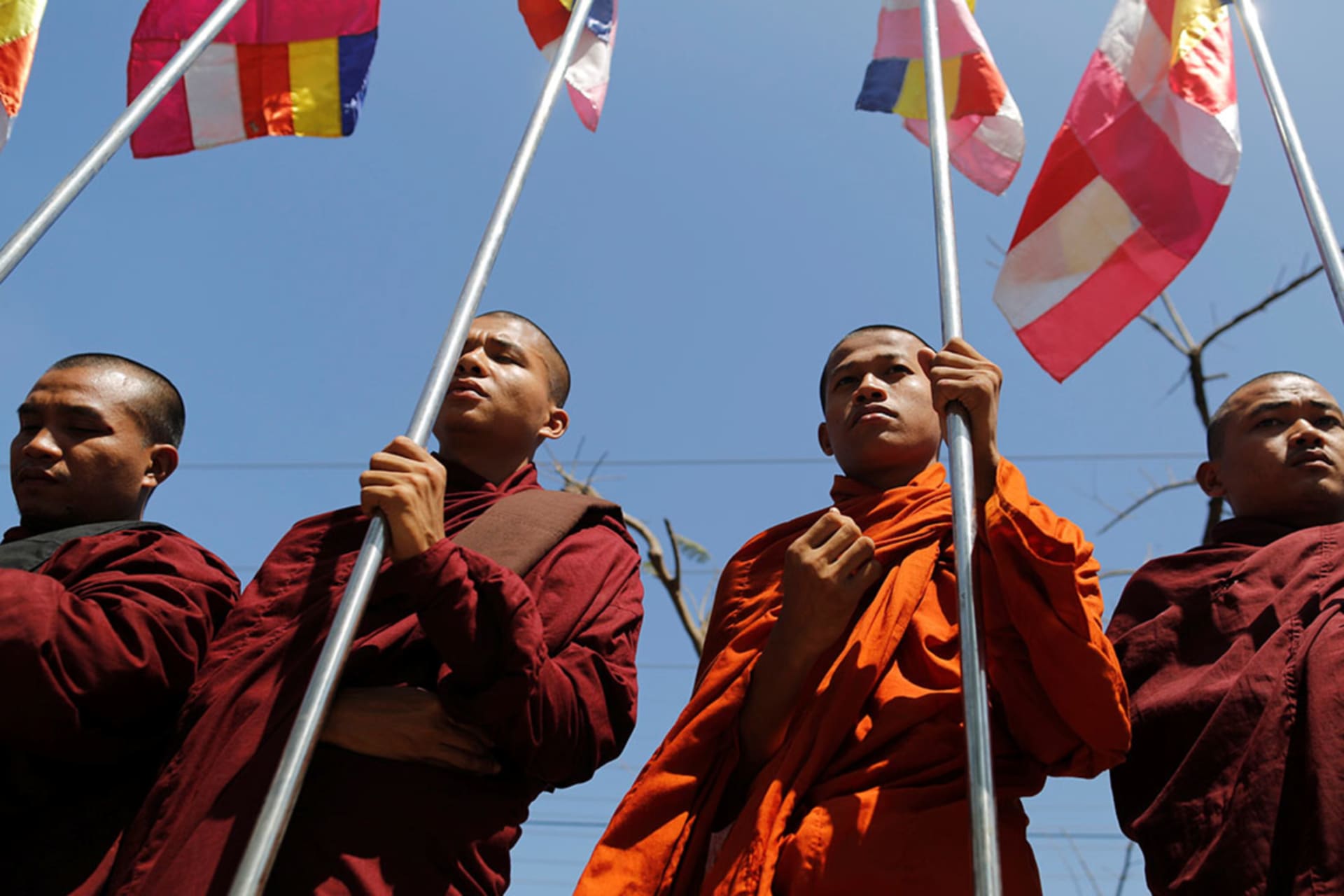 <p>Buddhist monks protest while Malaysian NGO’s aid ship carrying food and emergency supplies for Rohingya Muslims arrives at the port in Yangon, Myanmar on February 9, 2017.</p>
