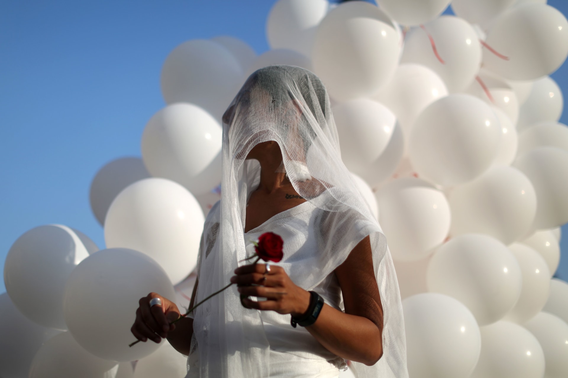 <p>A Lebanese activist celebrates the repeal of a law that allowed rapists to marry their victims to avoid prosecution.</p>
