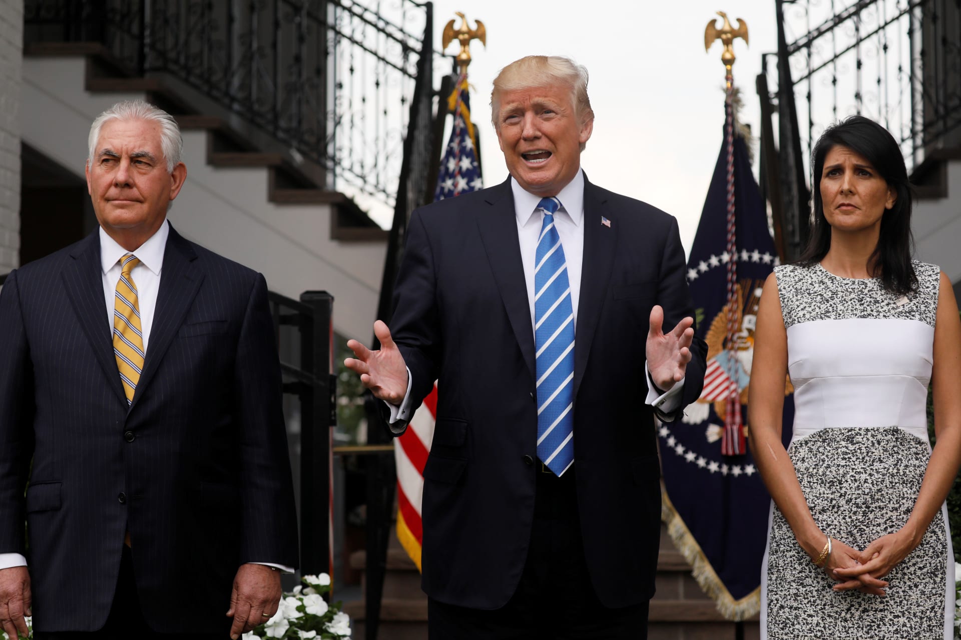 <p>U.S. President Donald Trump, flanked by Secretary of State Rex Tillerson (L) and U.S. Ambassador to the United Nations Nikki Haley (R) speaks to reporters after their meeting at Trump’s golf estate in Bedminster, New Jersey U.S. August 11, 2017.</p>
