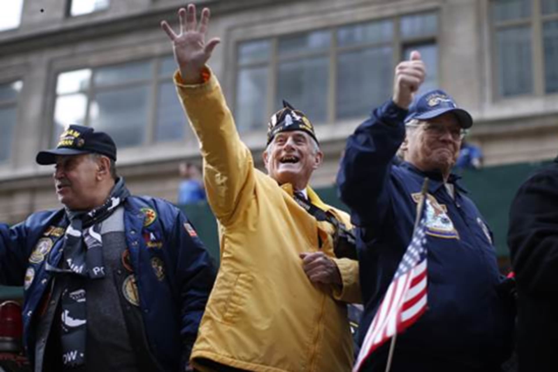 <p>Veterans march in a Veterans Day parade in New York City</p>

