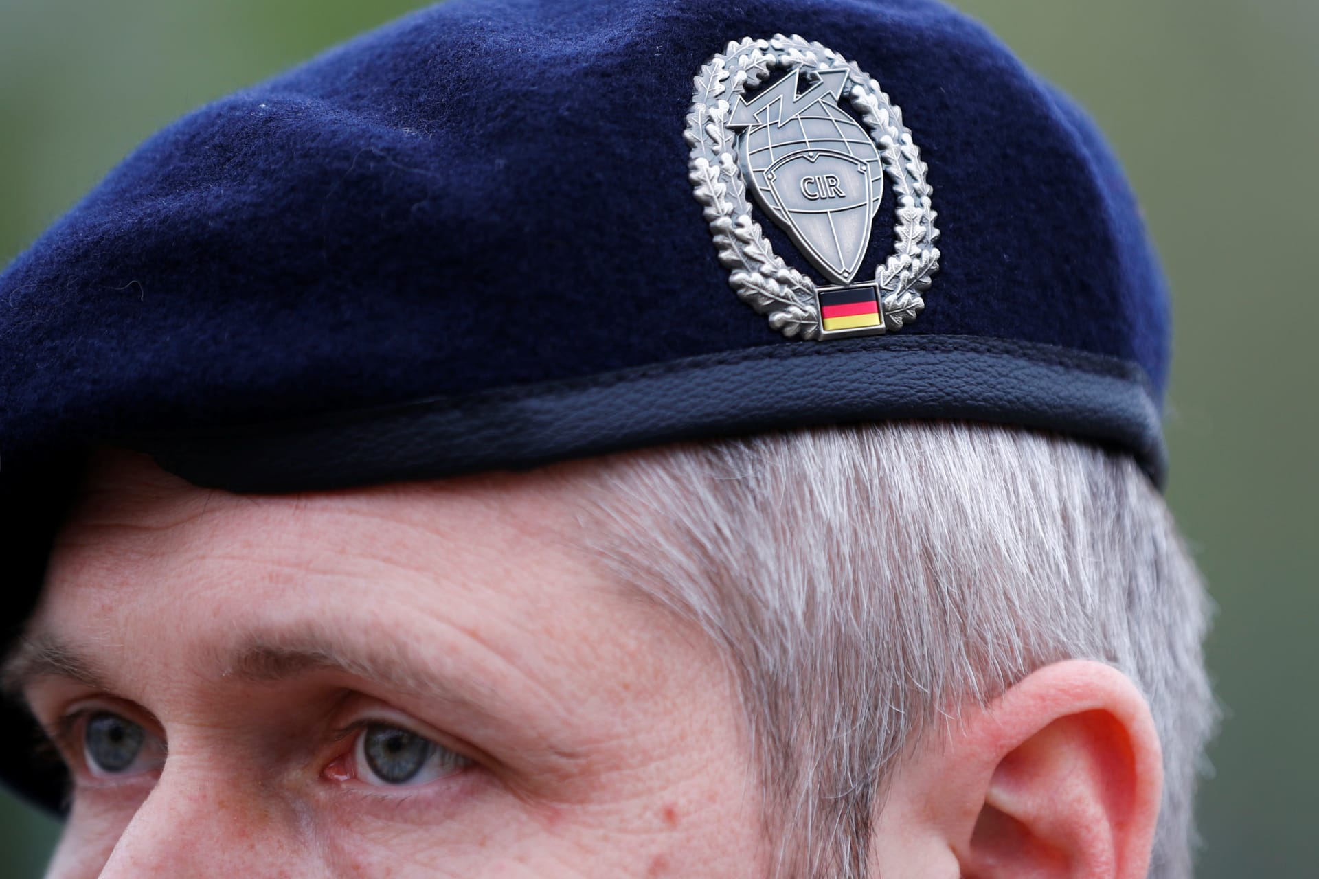 <p>The badge of Germany’s cyber and information space command on the cap of a soldier.</p>
