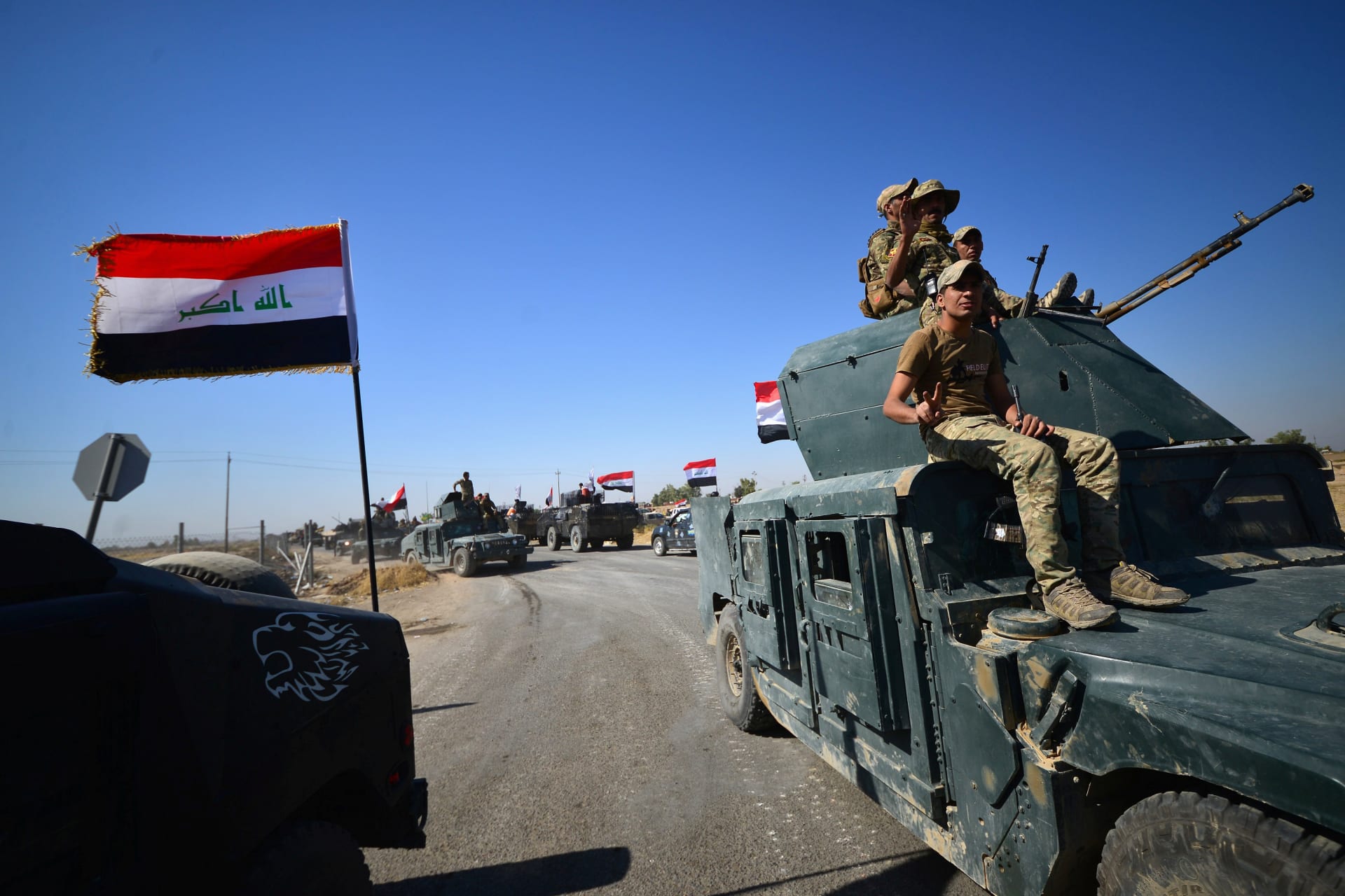 <p>Members of Iraqi federal forces gather to continue to advance in military vehicles in Kirkuk on October 16, 2017 (REUTERS/Stringer).</p>

