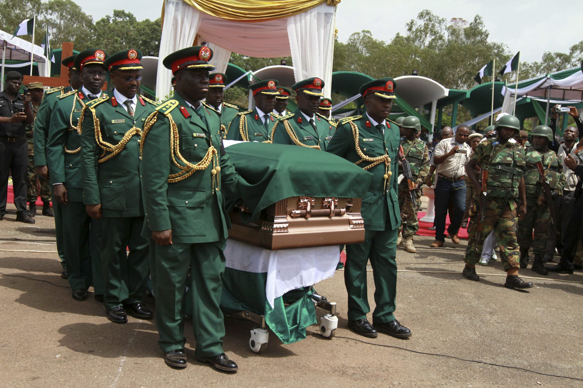 <p>Such are the twists and turns of contemporary Nigeria that Odumegwu-Ojukwu, the Biafran chief of state during the civil war, was pardoned by President Shehu Shagari in 1981 and honored at a national funeral in Enugu, Nigeria, on March 1, 2012.</p>
