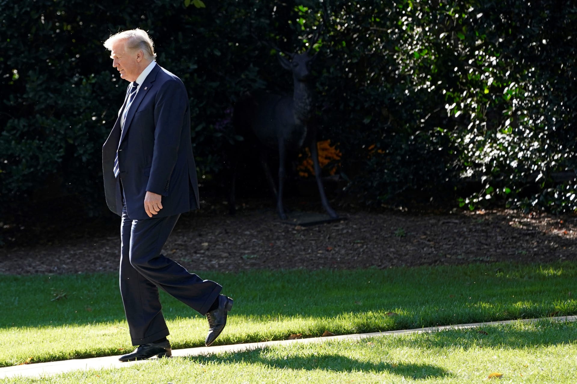 <p>U.S. President Donald J. Trump walks from the White House in Washington, DC, before his departure to Greer, South Carolina, on October 16, 2017.</p>
