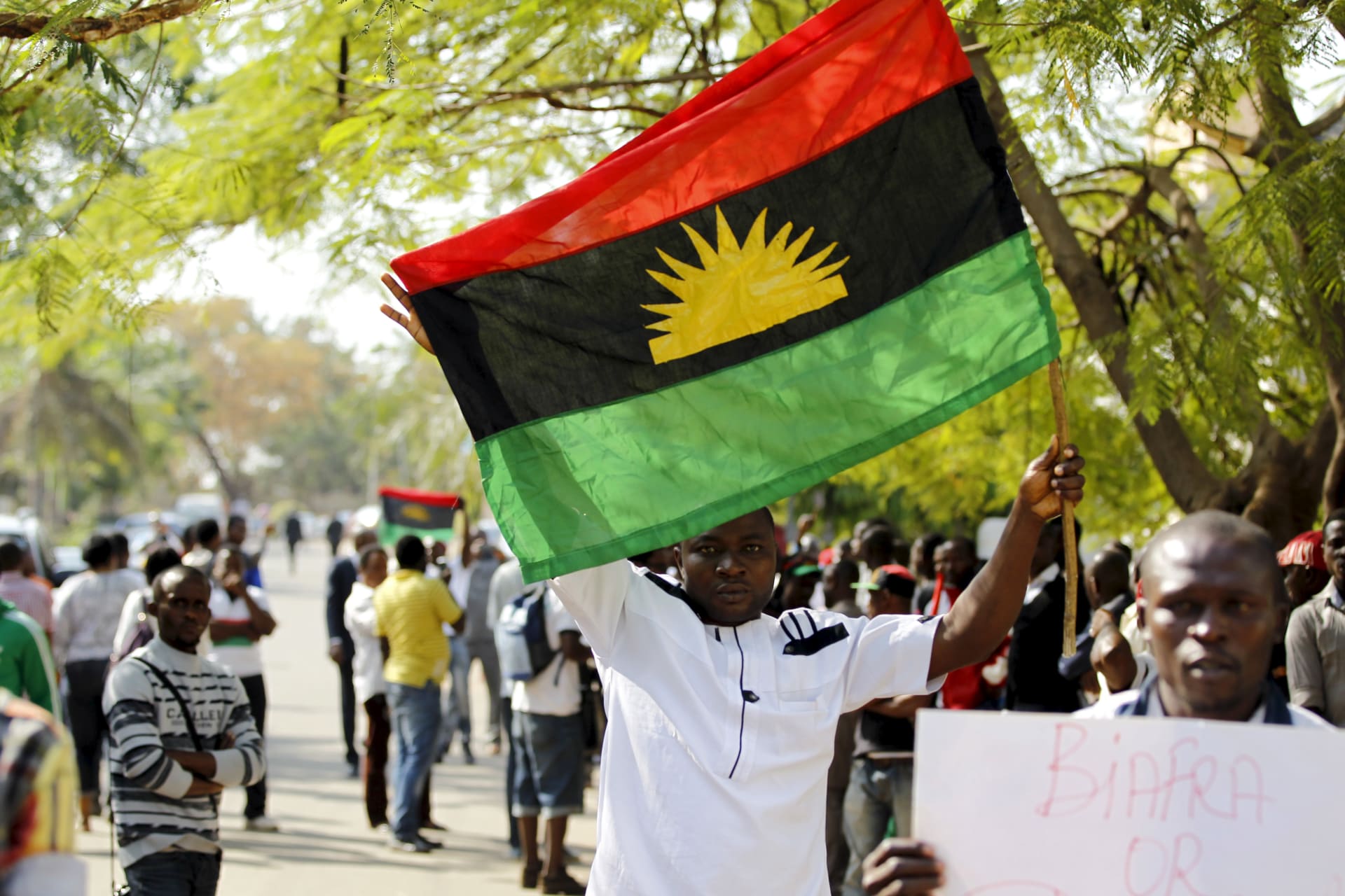 <p>A supporter of IPOB leader Nnamdi Kanu during a rally in support of Kanu, before he appeared at a magistrate court in Abuja, Nigeria December 1, 2015. Kanu has not been seen or heard from since September 14, when security services raided his home.</p>
