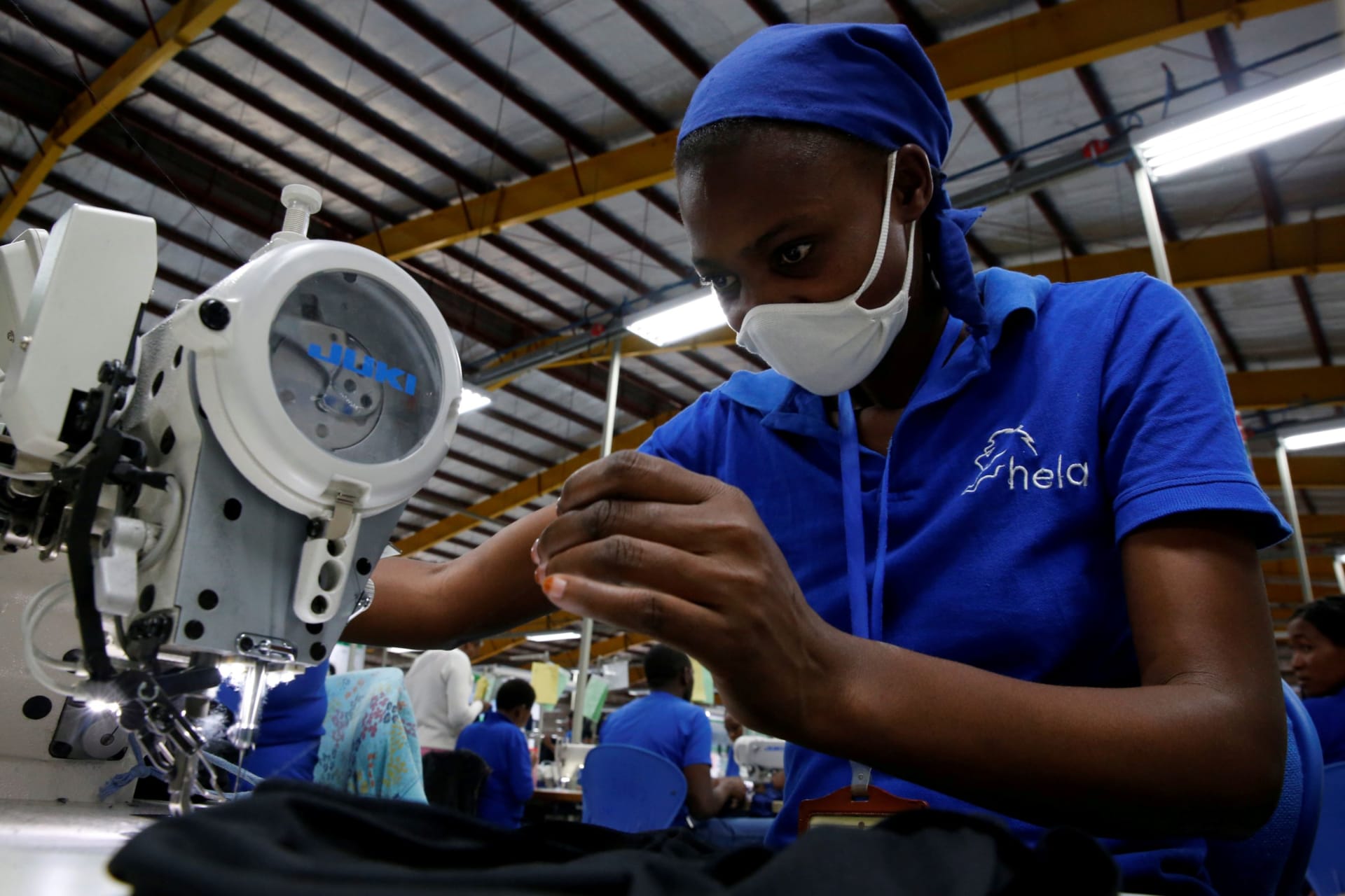 <p>A worker sews at an export processing zone factory in Athi River, Kenya.</p>
