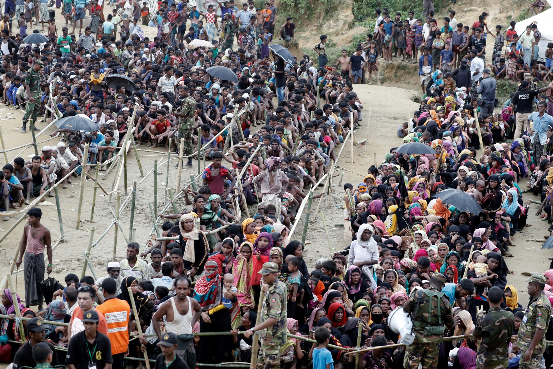 <p>Rohingya refugees queue for aid at Cox’s Bazar, Bangladesh, on September 26, 2017. </p>