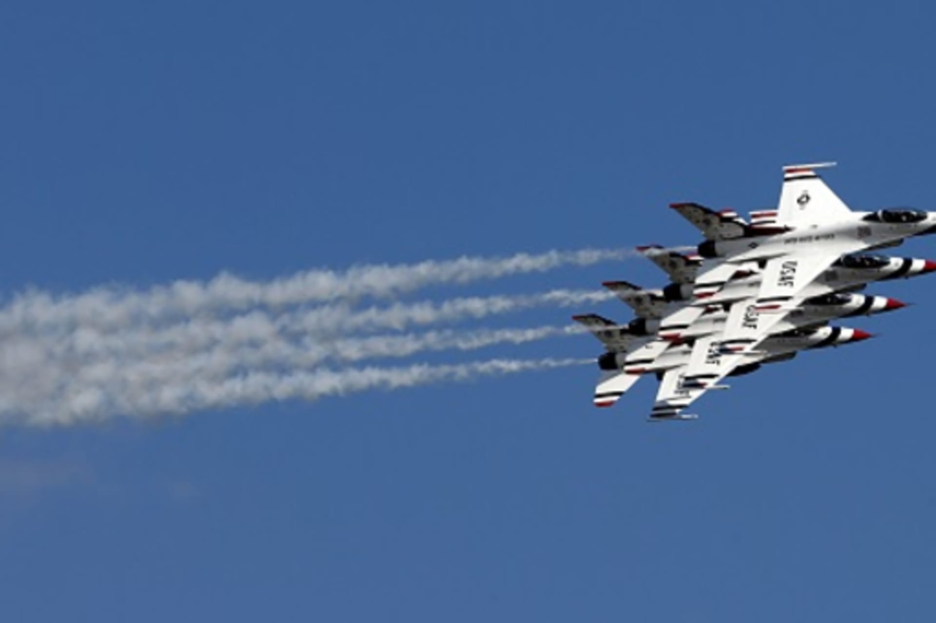 <p>The Thunderbirds performing at Joint Base Andrews</p>
