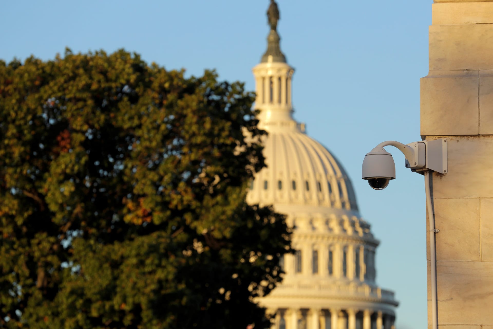 <p>A security camera hangs near the U.S. Capitol in Washington, DC in November 2016.</p>
