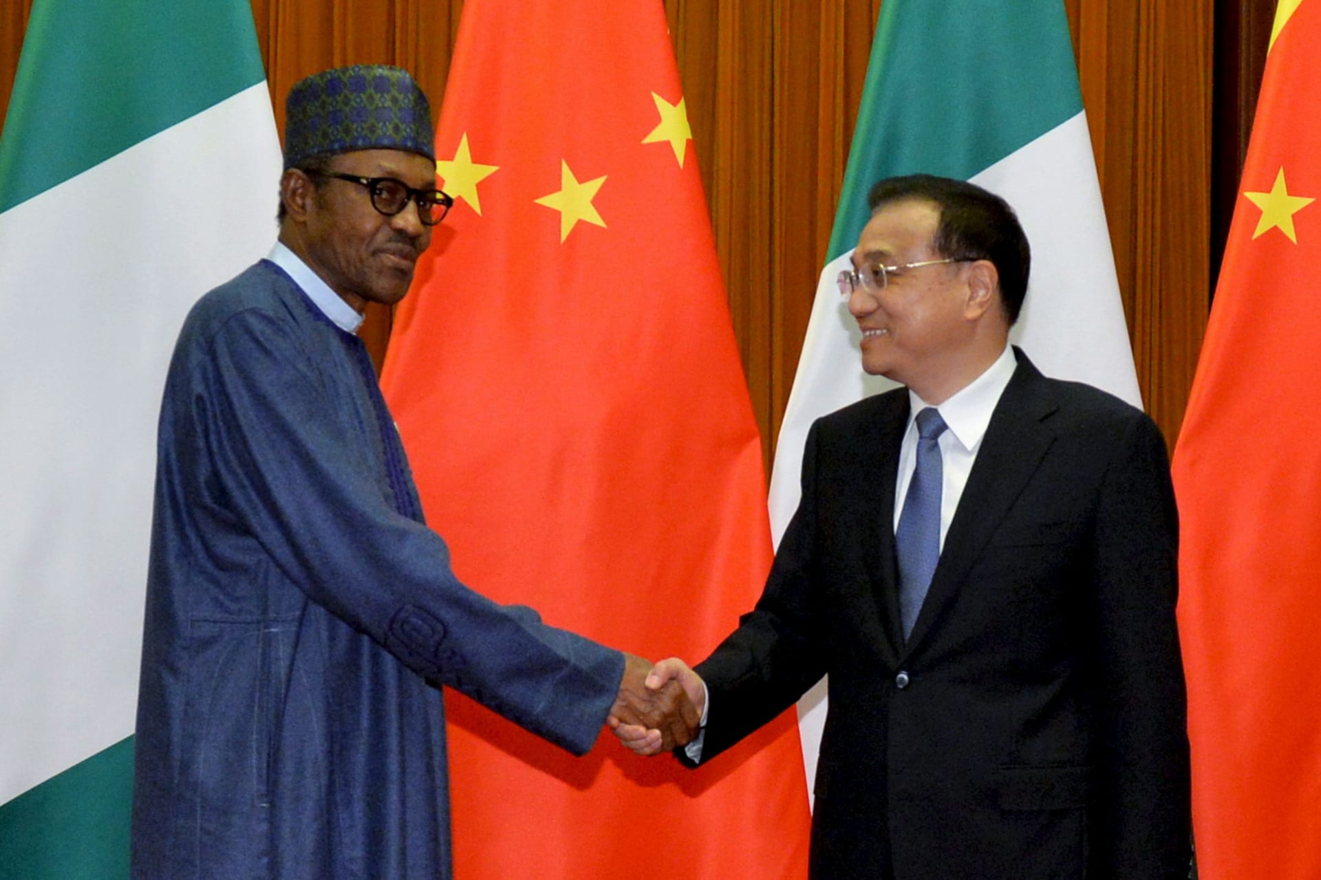 <p>President of Nigeria, Muhammadu Buhari (L) and Chinese Premier, Li Keqiang in Beijing, April 13, 2016. The Chinese government is heavily involved in infrastructure investment in Nigeria and the African continent as a whole.</p>
