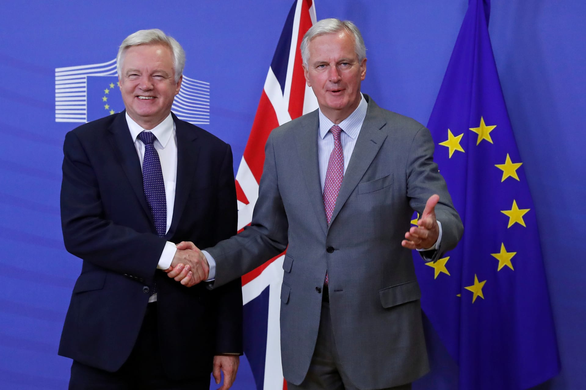 <p>UK Secretary of State for Exiting the European Union David Davis (L) is welcomed by the European Commission’s Chief Brexit Negotiator Michel Barnier.</p>
