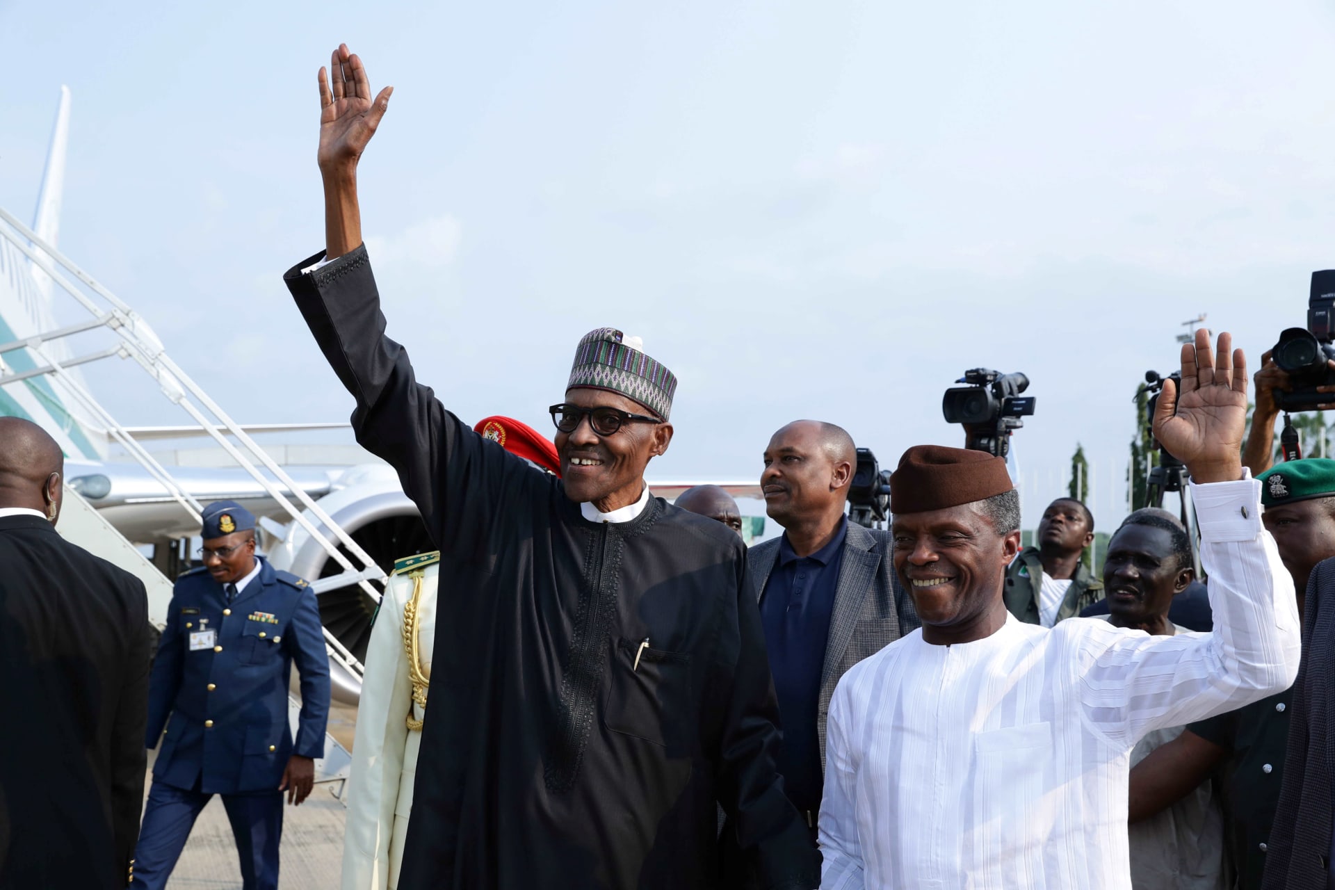 <p>Nigeria’s President Muhammadu Buhari and Vice Prsident Yemi Osinbajo at Nnamdi Azikiwe airport in Abuja, Nigeria August 19, 2017 after Buhari’s return from extended medical leave in Britain.</p>
