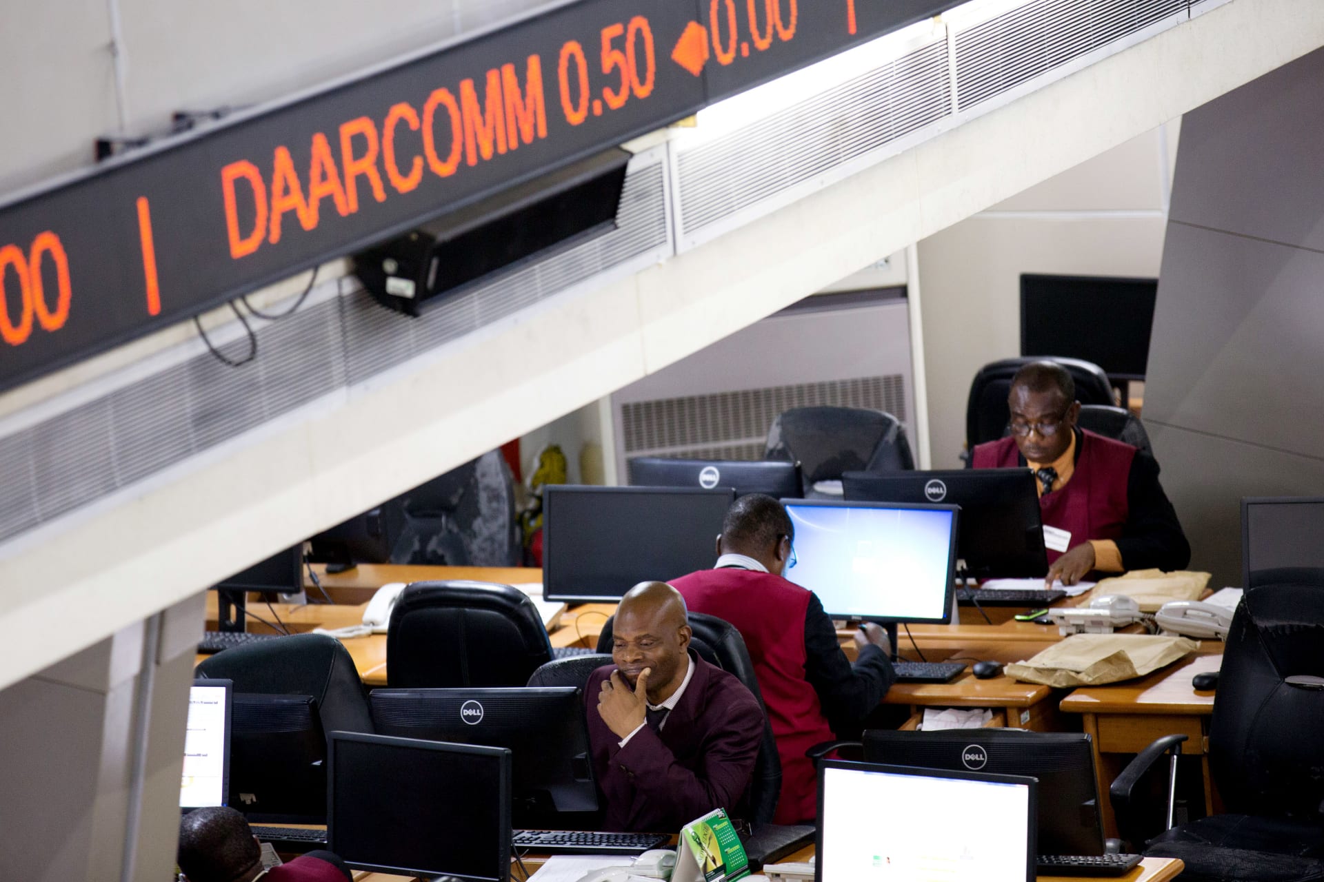 <p>Traders work at the Nigerian Stock Exchange where venture capitalists have the opportunity to invest in startups and other entrepreneurial projects in Lagos, February 13, 2015. </p>
