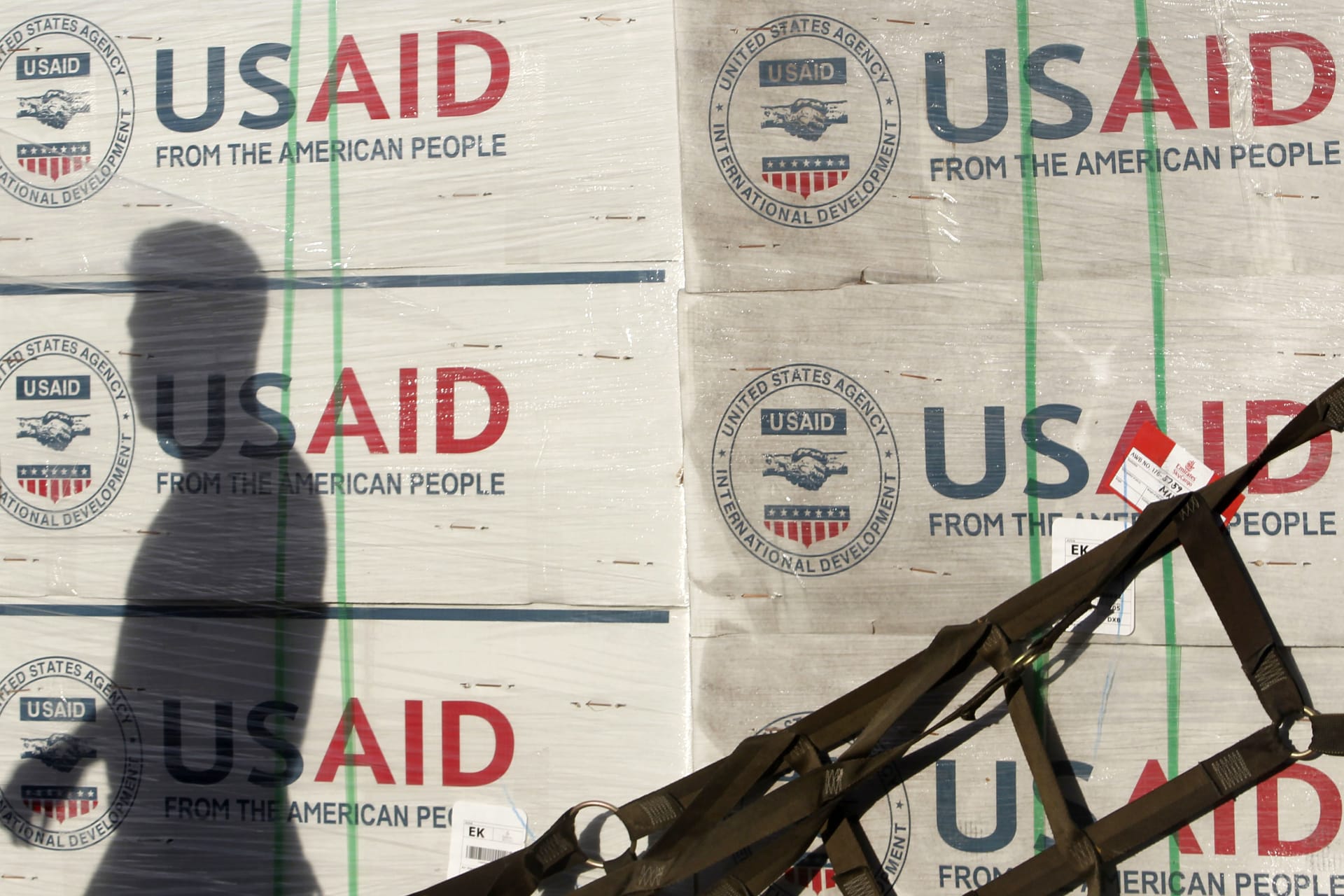 <p>The shadow of a Philippine Army personnel is cast on boxes of relief items from U.S. Agency for International Development (USAID), November 13, 2013. </p>
