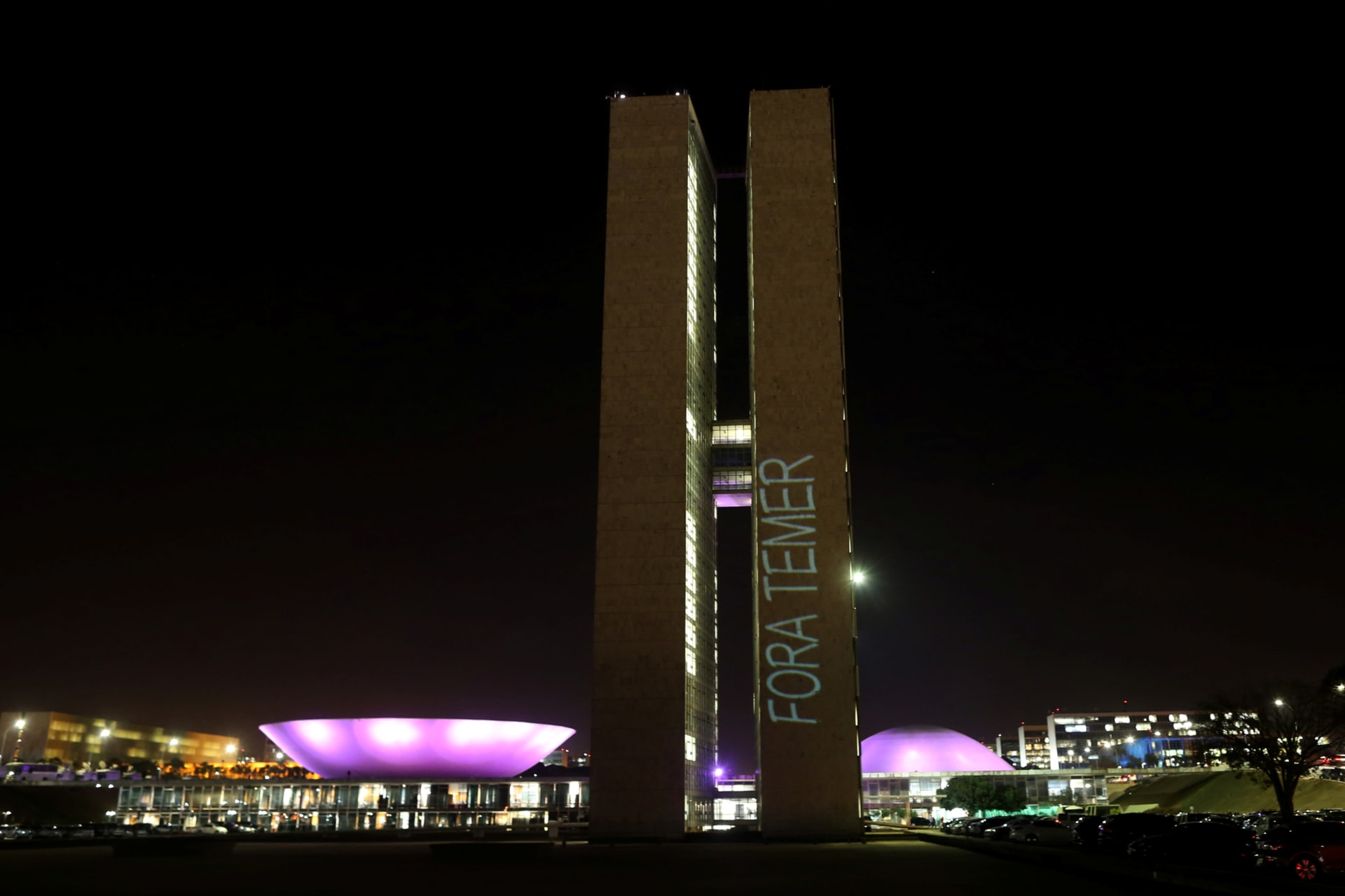 <p>A projection with the message “Out Temer” in reference of Brazilian President Michel Temer, is seen on the National Congress in Brasilia, Brazil August 1, 2017.</p>
