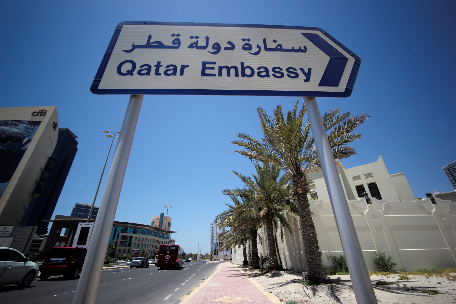 <p>A sign indicating a route to Qatar embassy in Manama, Bahrain, on June 5, 2017.</p>
