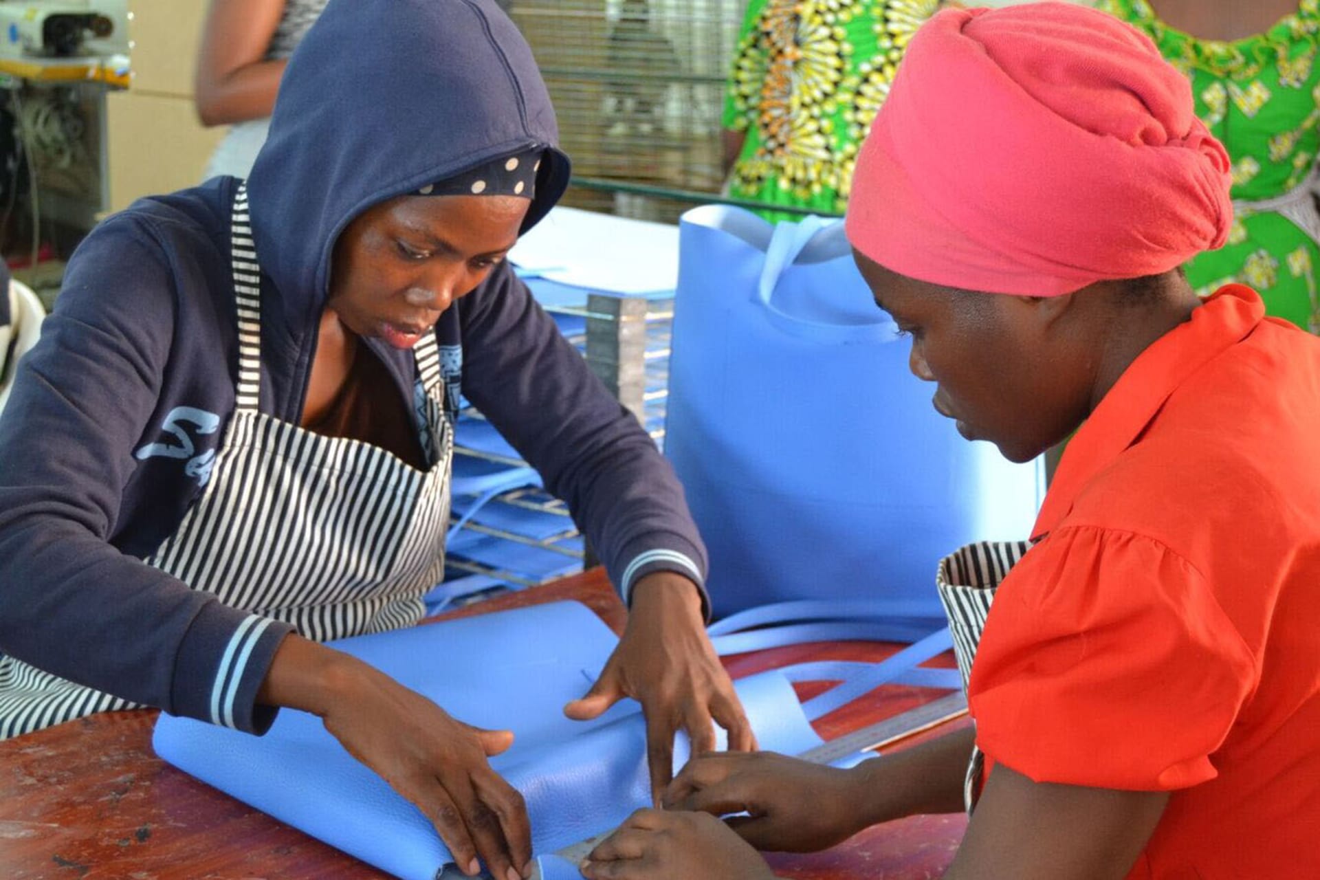 <p>Rwandan artisans at work.</p>
