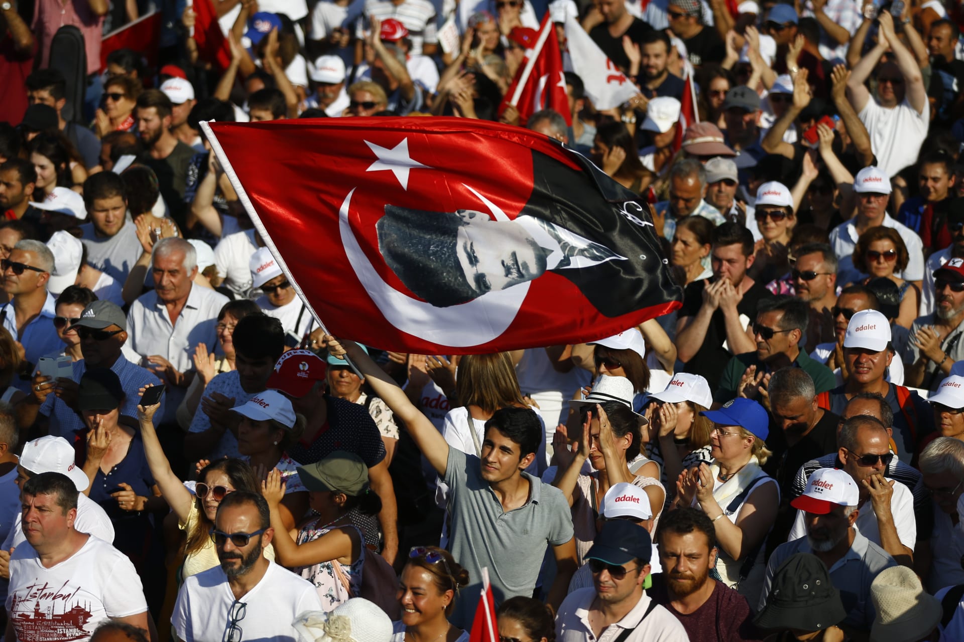 <p>People shout slogans as Turkey’s main opposition Republican People’s Party leader Kemal Kilicdaroglu (not pictured) walks on the final stage of his 25-day long protest (Osman Orsal/Reuters).</p>
