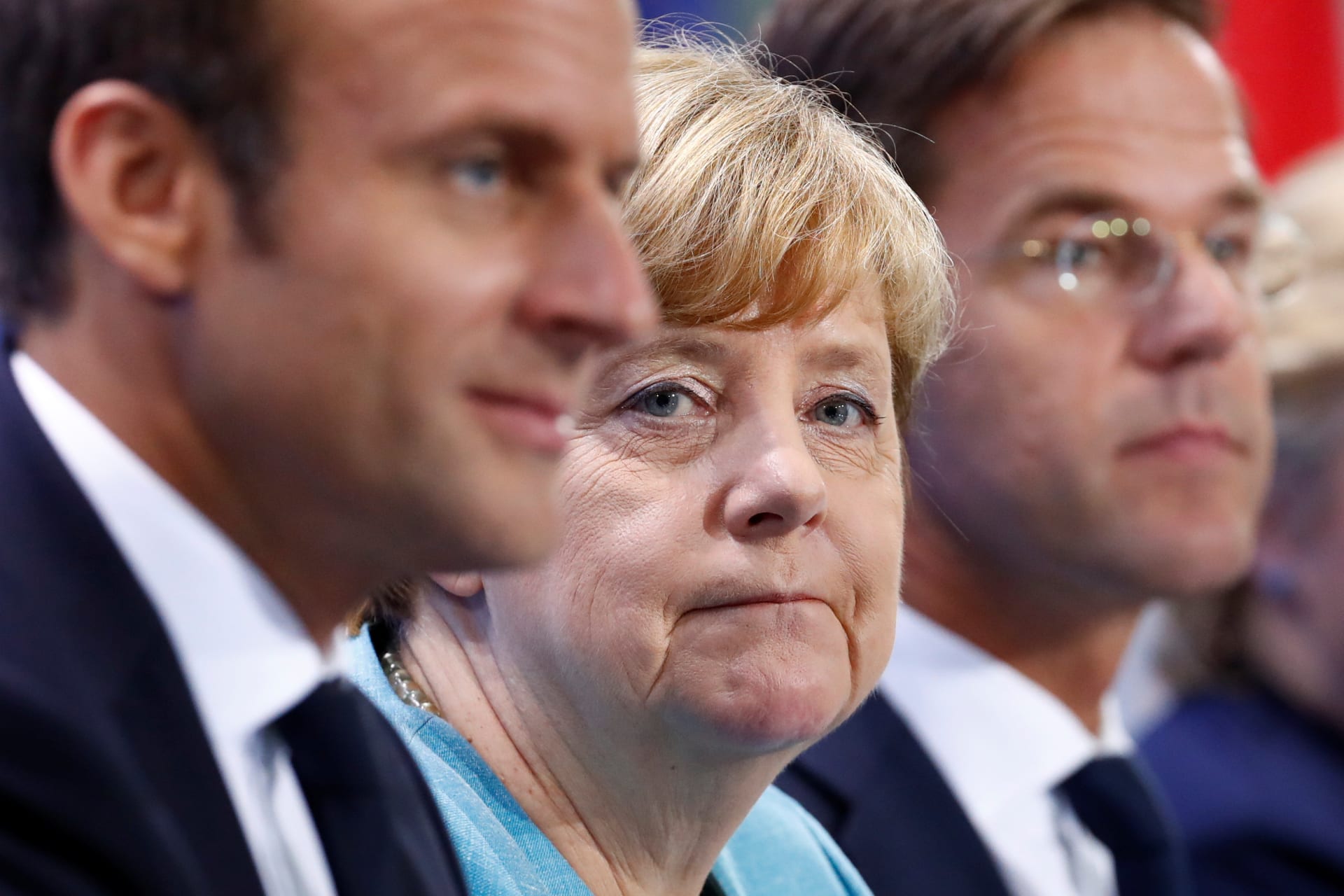 <p>French President Emmanuel Macron, German Chancellor Angela Merkel and Dutch Prime Minister Mark Rutte attend the press conference after the meeting at the Chancellery in Berlin, Germany.</p>

