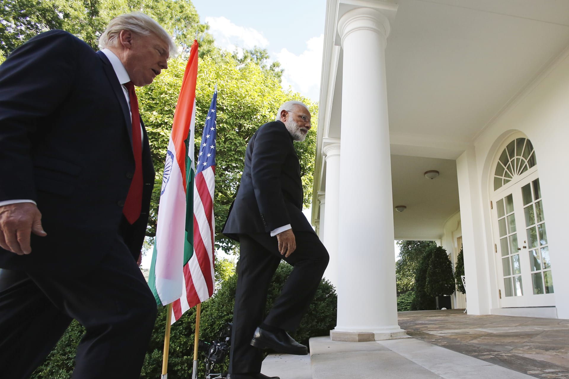 <p>U.S. President Donald J. Trump (L) and India’s Prime Minister Narendra Modi head back to the Oval Office after delivering joint statements in the Rose Garden of the White House in Washington, DC, June 26, 2017.</p>
