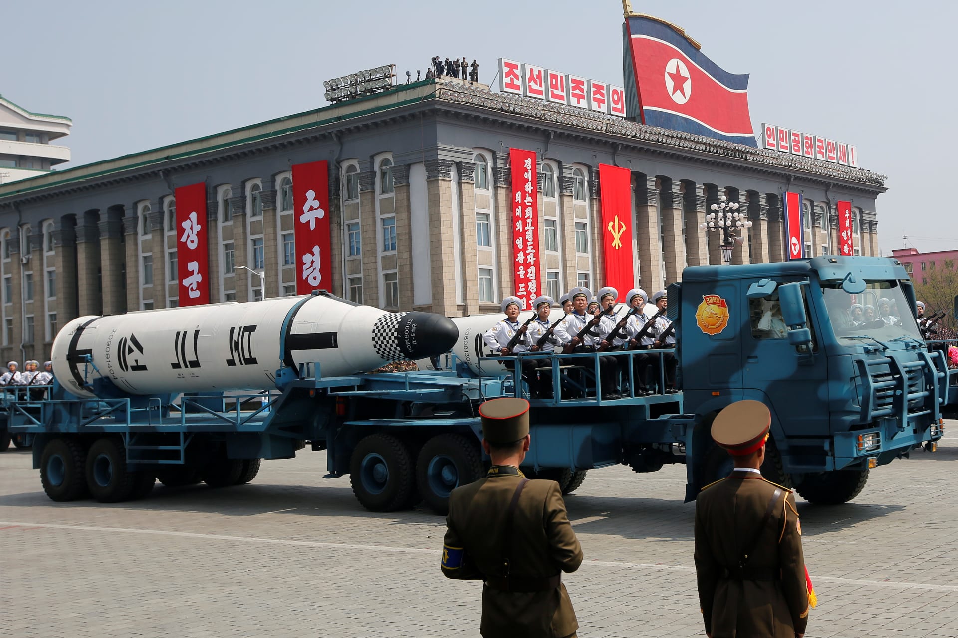 <p>Vehicles carry missiles during a military parade in Pyongyang.</p>
