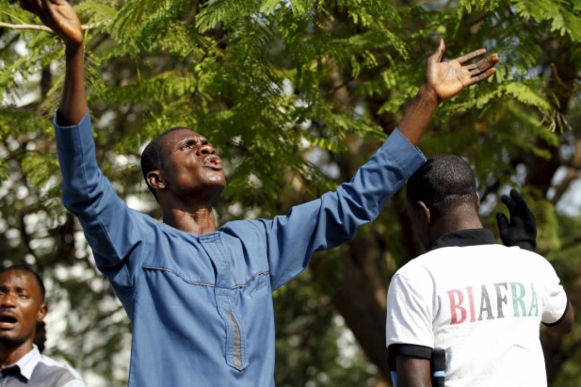 <p>A Biafra supporter prays during a rally in support of Indigenous People of Biafra (IPOB) leader Nnamdi Kanu, who is expected to appear at a magistrate court in Abuja, Nigeria December 1, 2015.</p>
